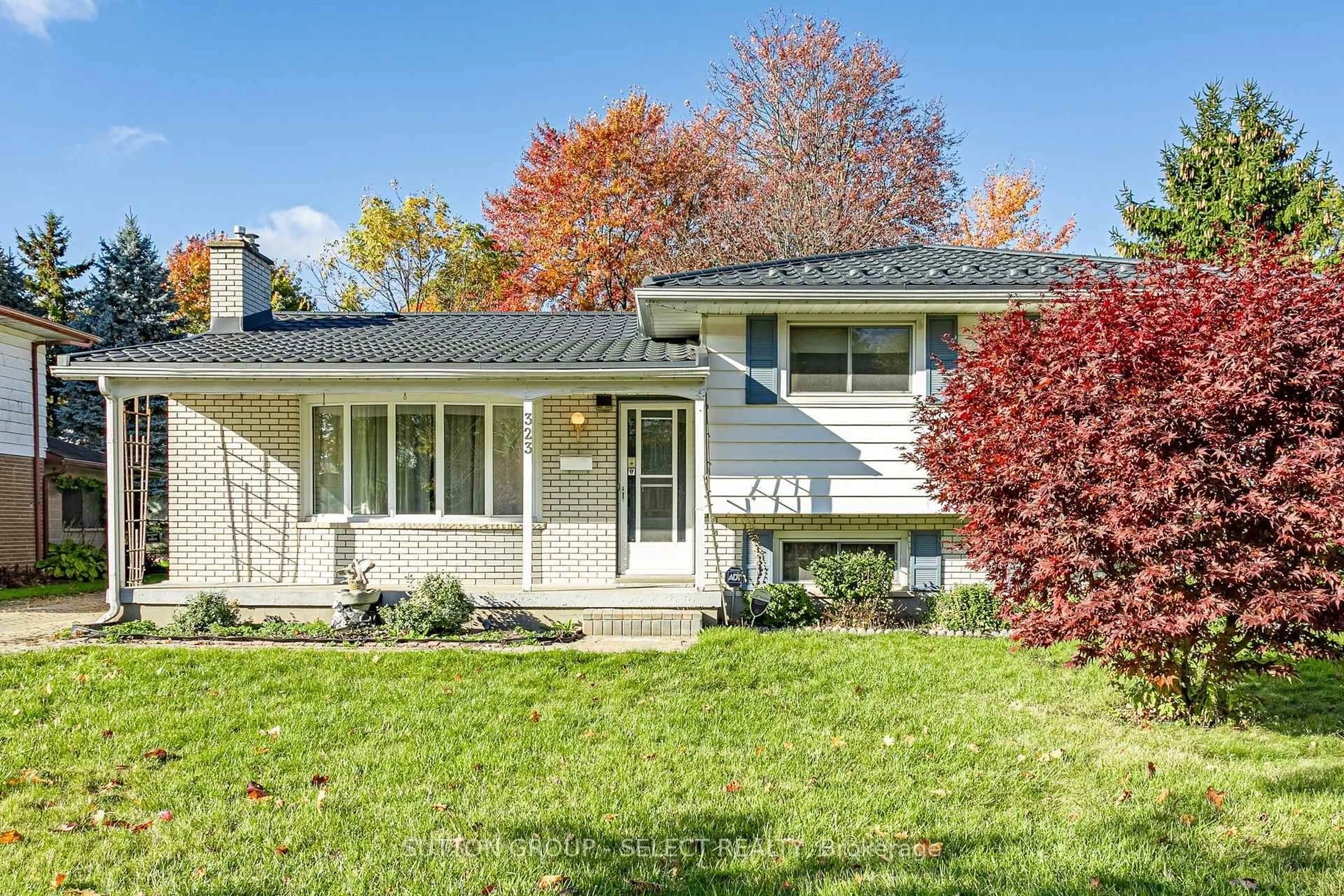 Home with vinyl exterior material, street for 323 Base Line Rd, London South Ontario N6J 1W5