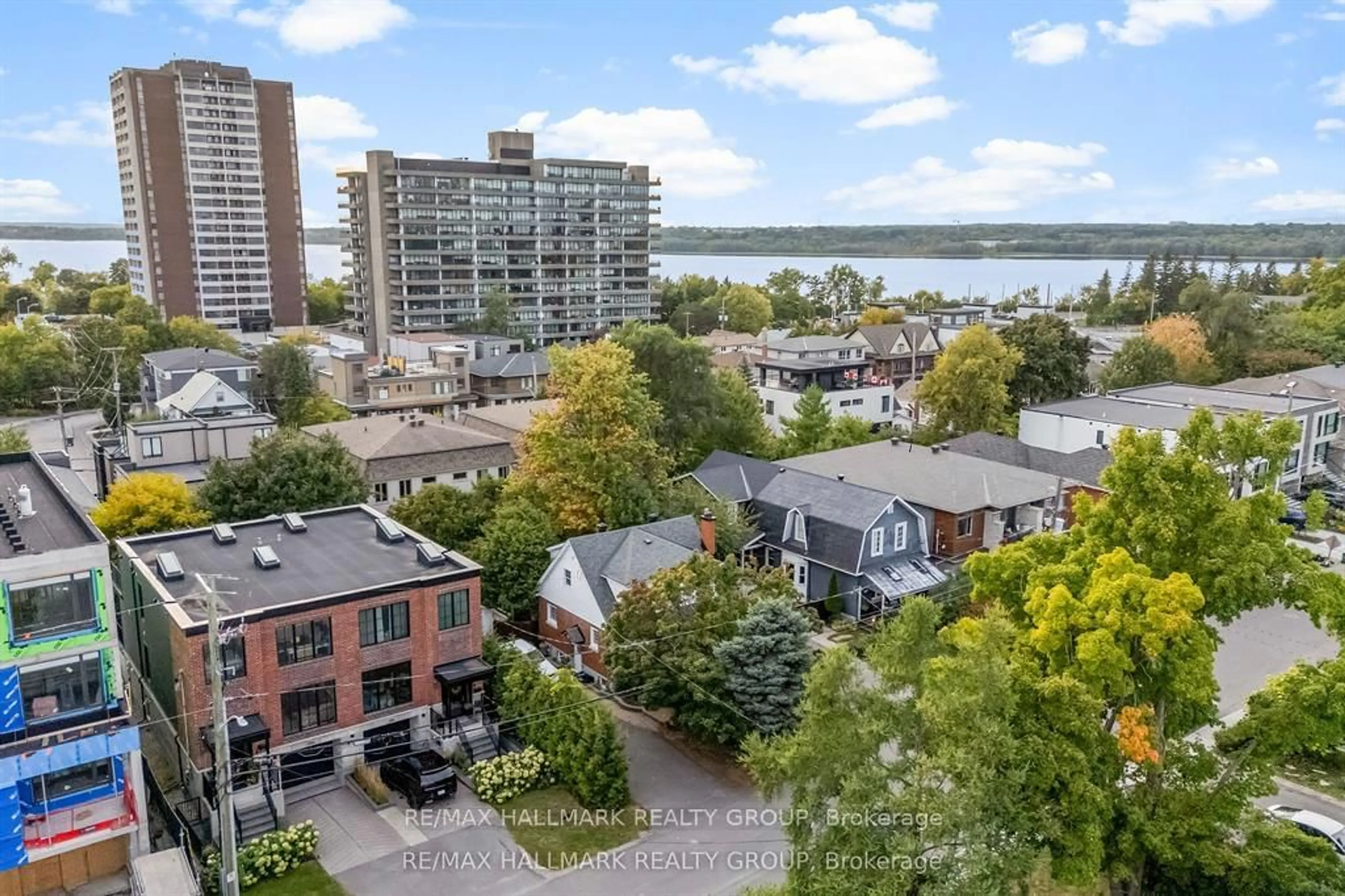 A pic from outside/outdoor area/front of a property/back of a property/a pic from drone, water/lake/river/ocean view for 396 Roosevelt Ave, Ottawa Ontario K2A 1Z3