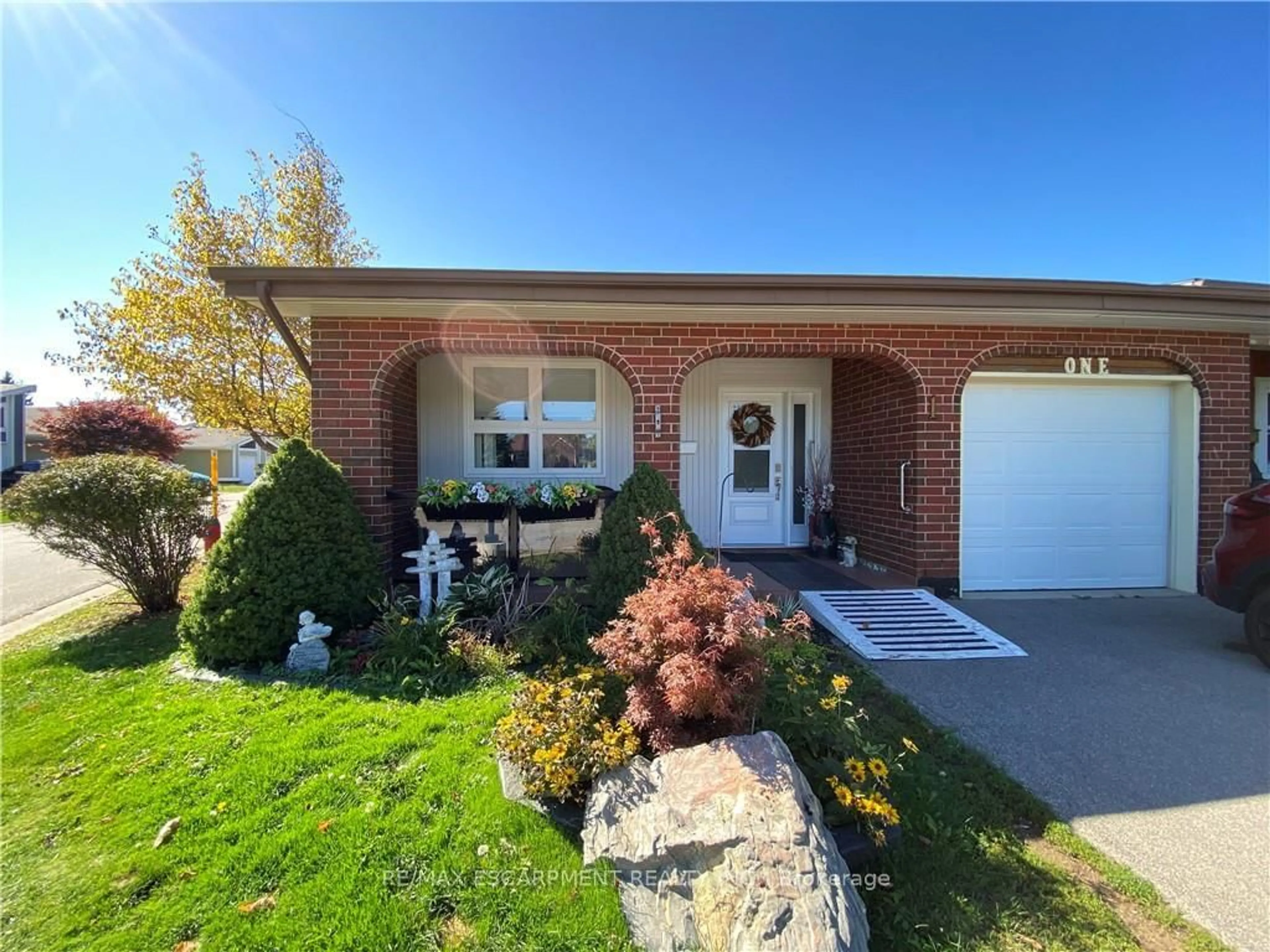Home with brick exterior material, street for 1 Monsignor Henkey Terr, Hamilton Ontario L9B 2M2