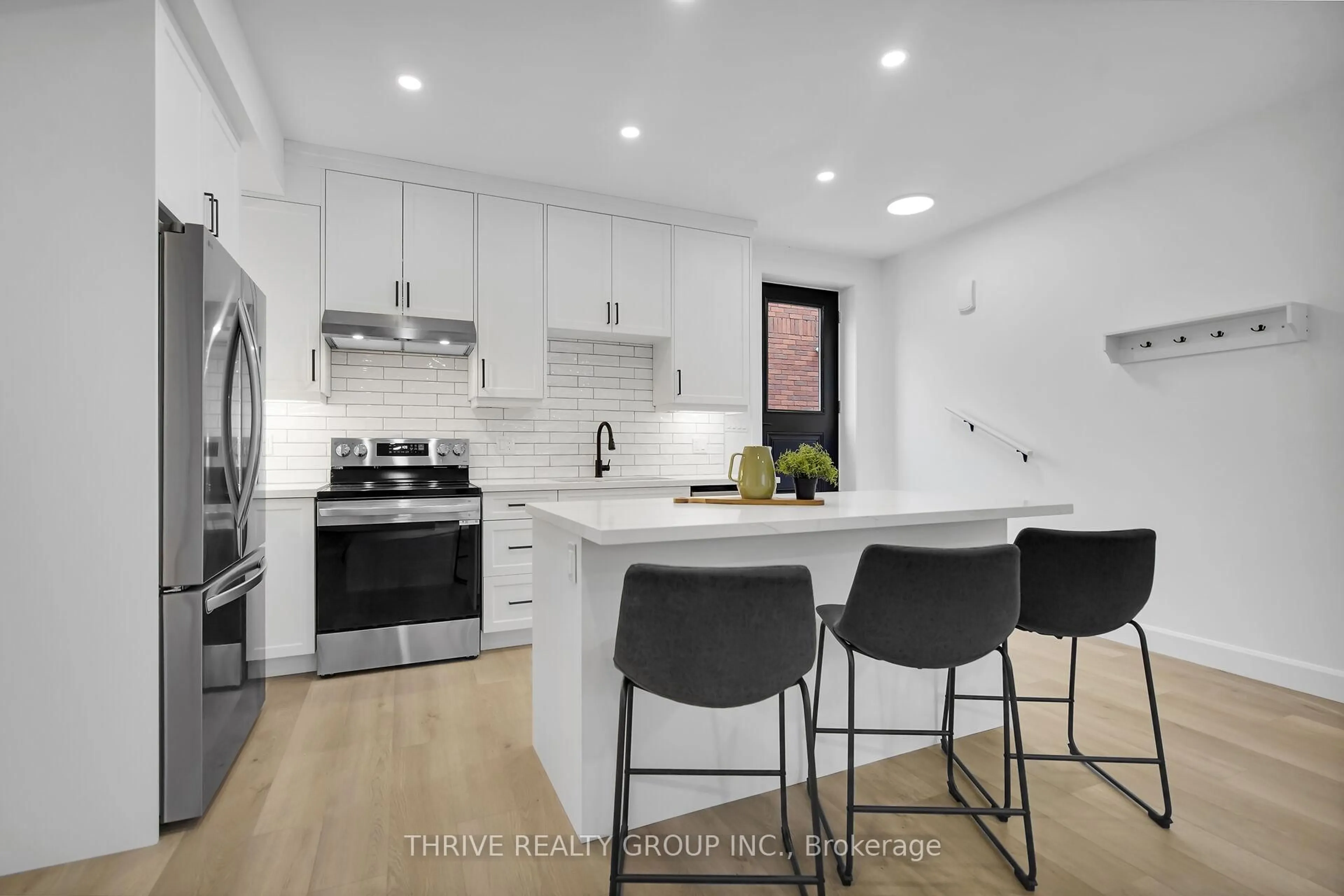 Open concept kitchen, ceramic/tile floor for 74 Church St #7, Stratford Ontario N5A 2R2