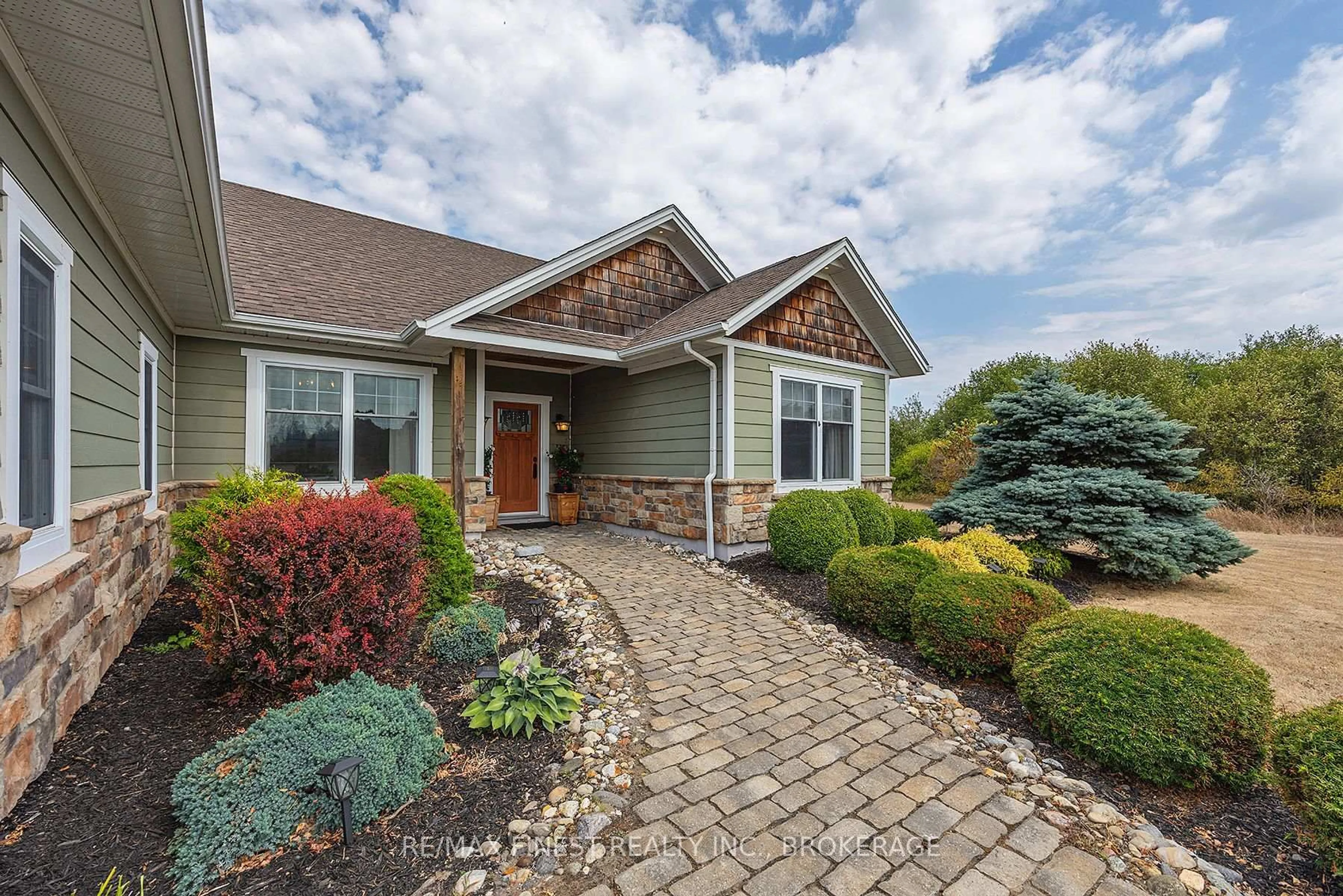 Home with brick exterior material, street for 1247 Millhaven Rd, Bissett Creek Ontario K0H 2H0