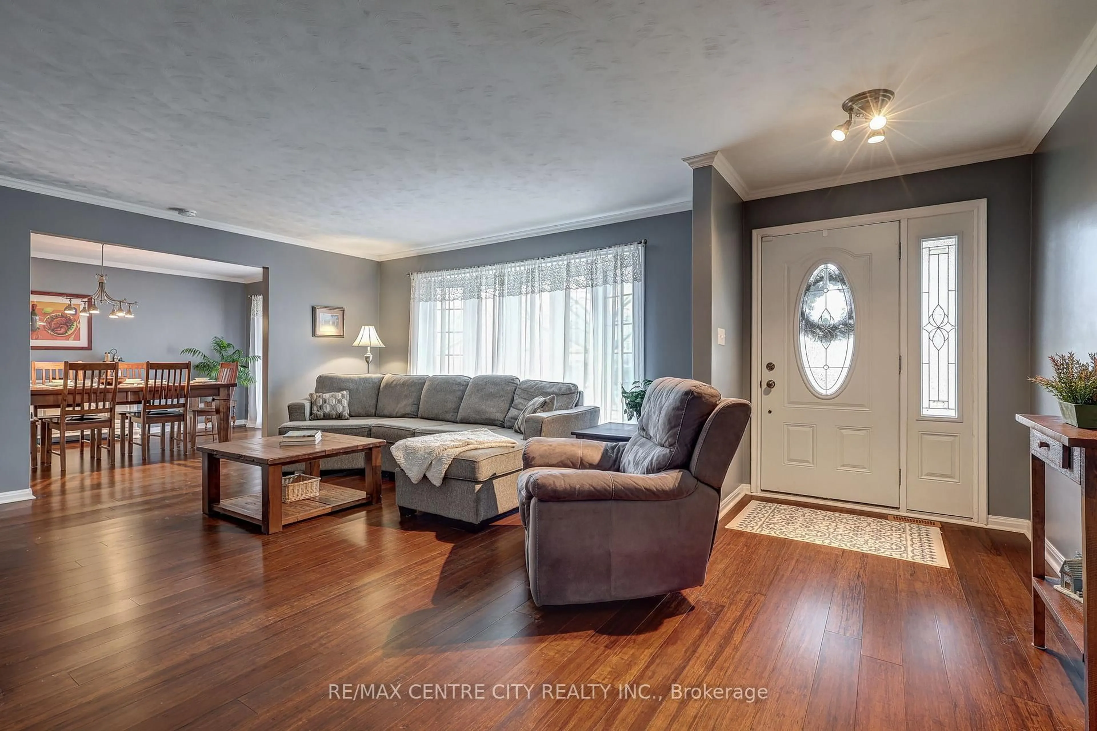 Living room with furniture, wood/laminate floor for 9255 West St, Bayham Ontario N0J 1Y0