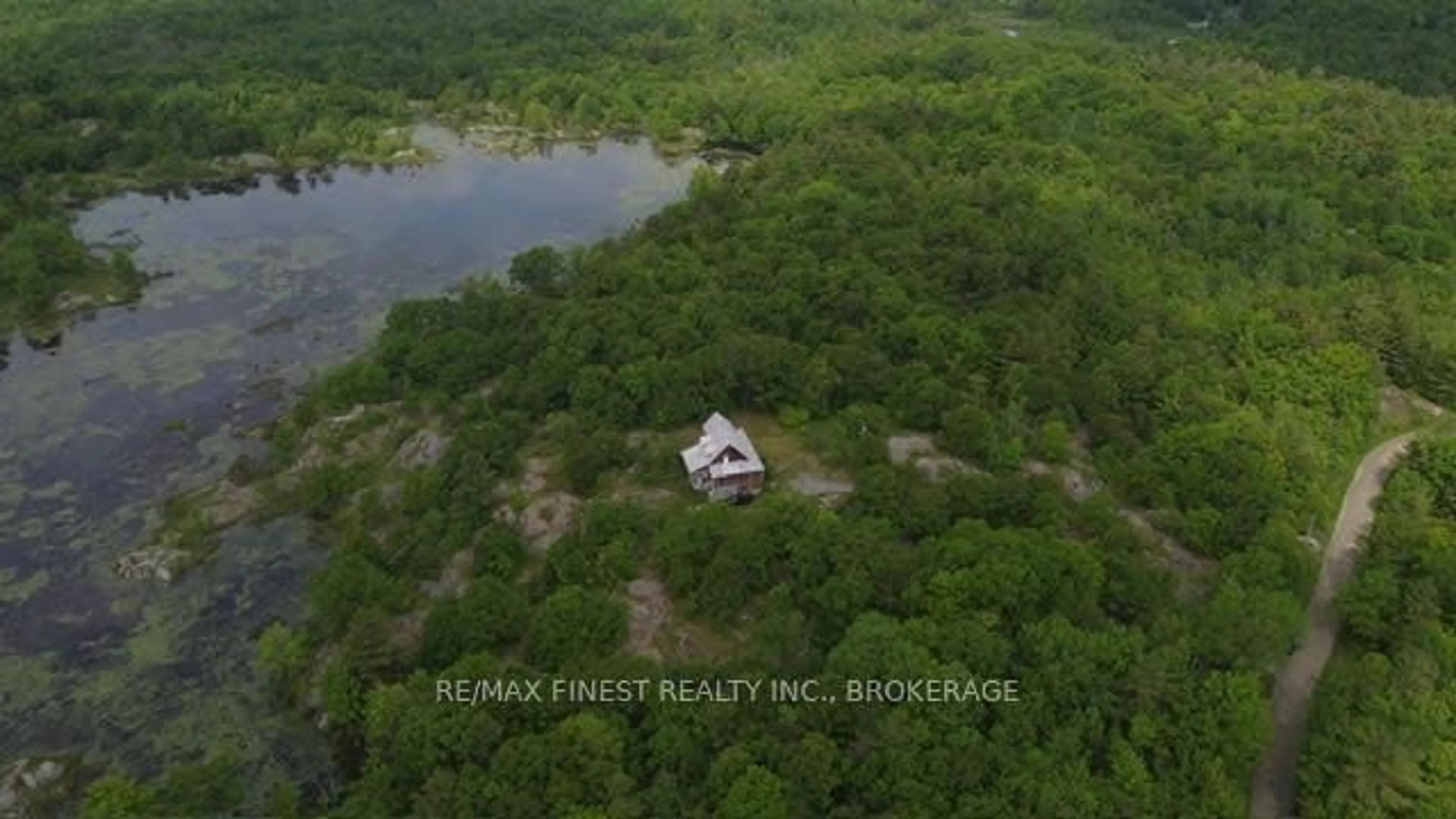 A pic from outside/outdoor area/front of a property/back of a property/a pic from drone, water/lake/river/ocean view for 1146 Fourth Lake Rd, Parham Ontario K0H 2K0