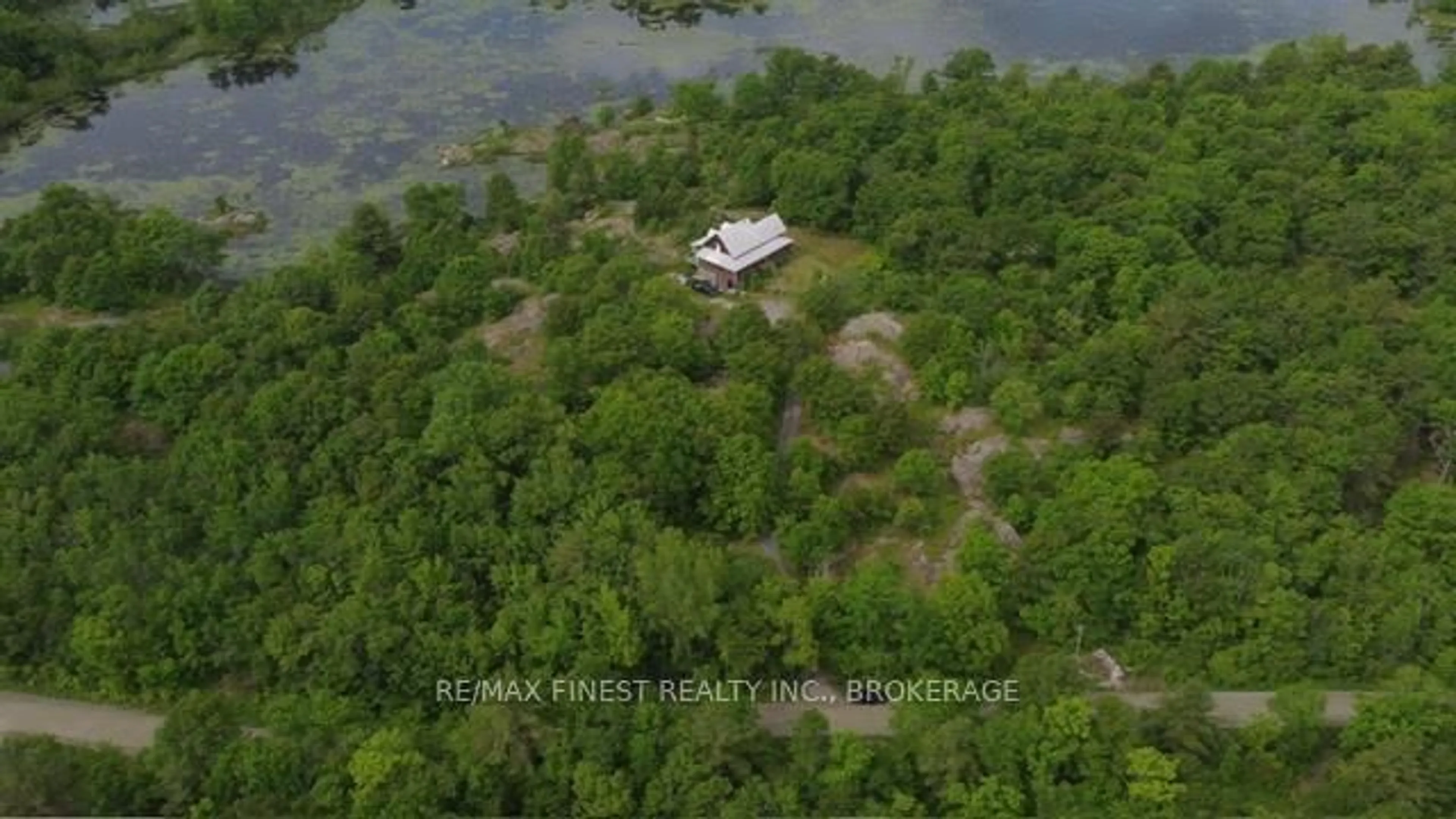 A pic from outside/outdoor area/front of a property/back of a property/a pic from drone, water/lake/river/ocean view for 1146 Fourth Lake Rd, Parham Ontario K0H 2K0