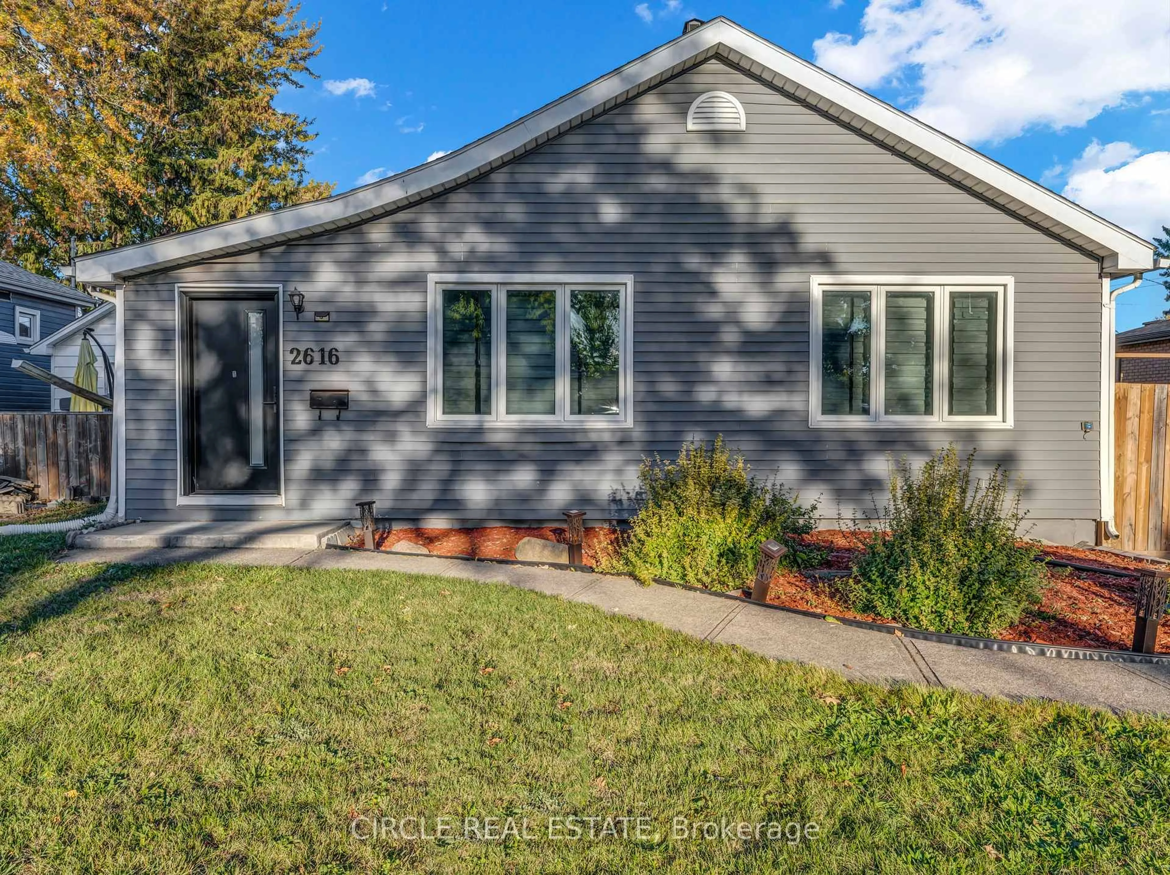 Home with vinyl exterior material, street for 2616 Tourangeau Rd, Windsor Ontario N8W 4N9