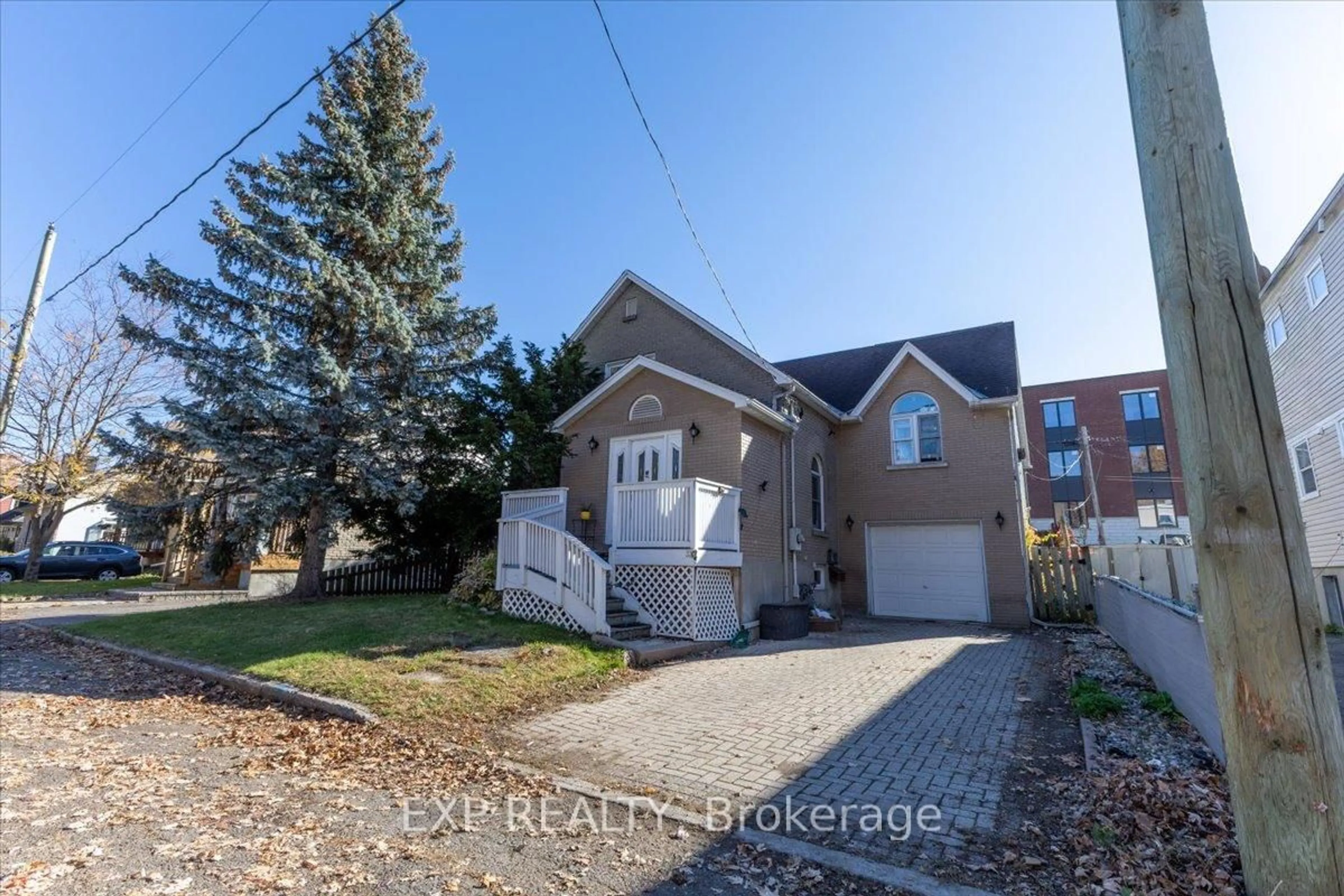 Home with brick exterior material, street for 320 Joffre-Belanger Way, Ottawa Ontario K1L 5K4