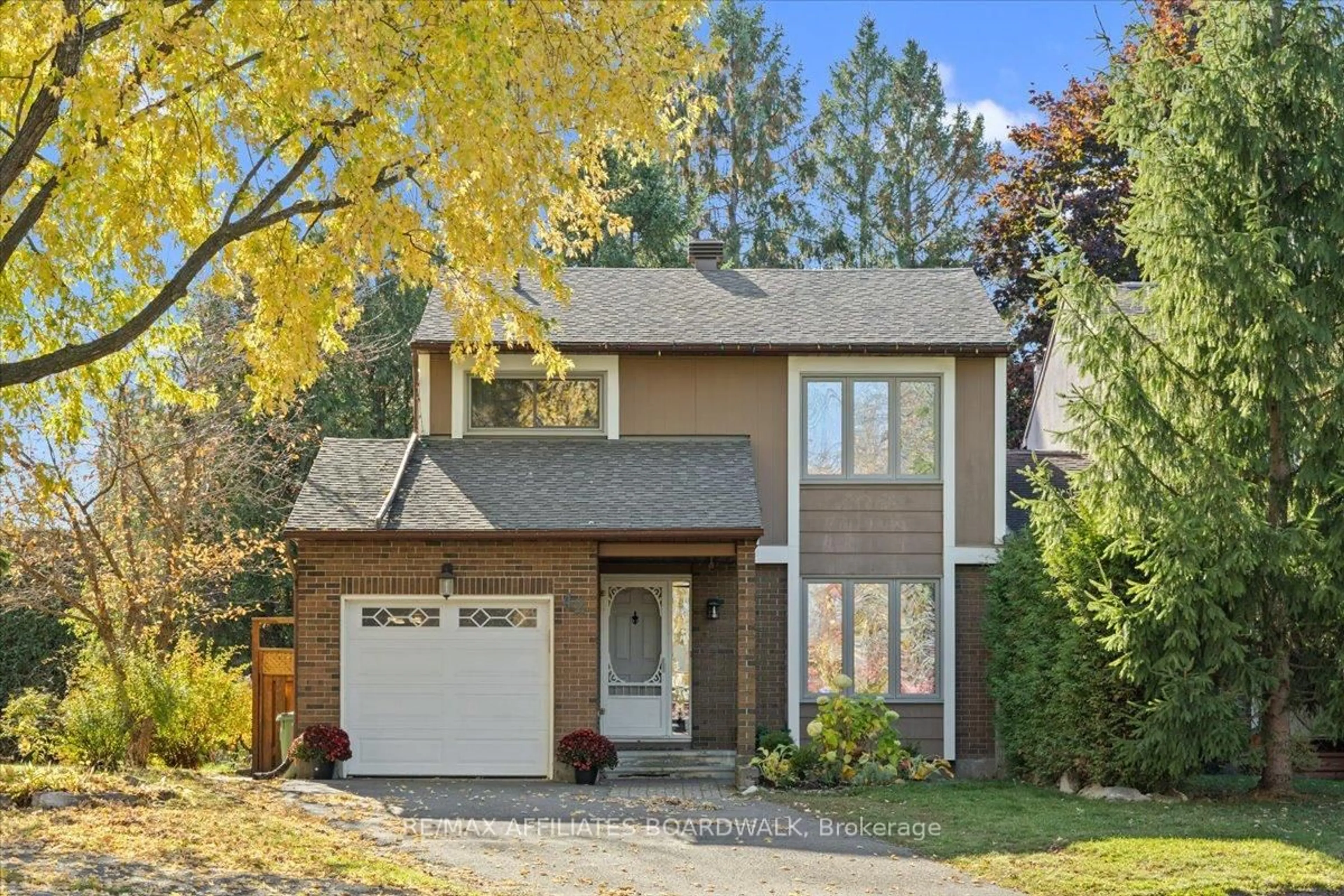 Home with brick exterior material, street for 42 Haywood Cres, Ottawa Ontario K2L 2J2