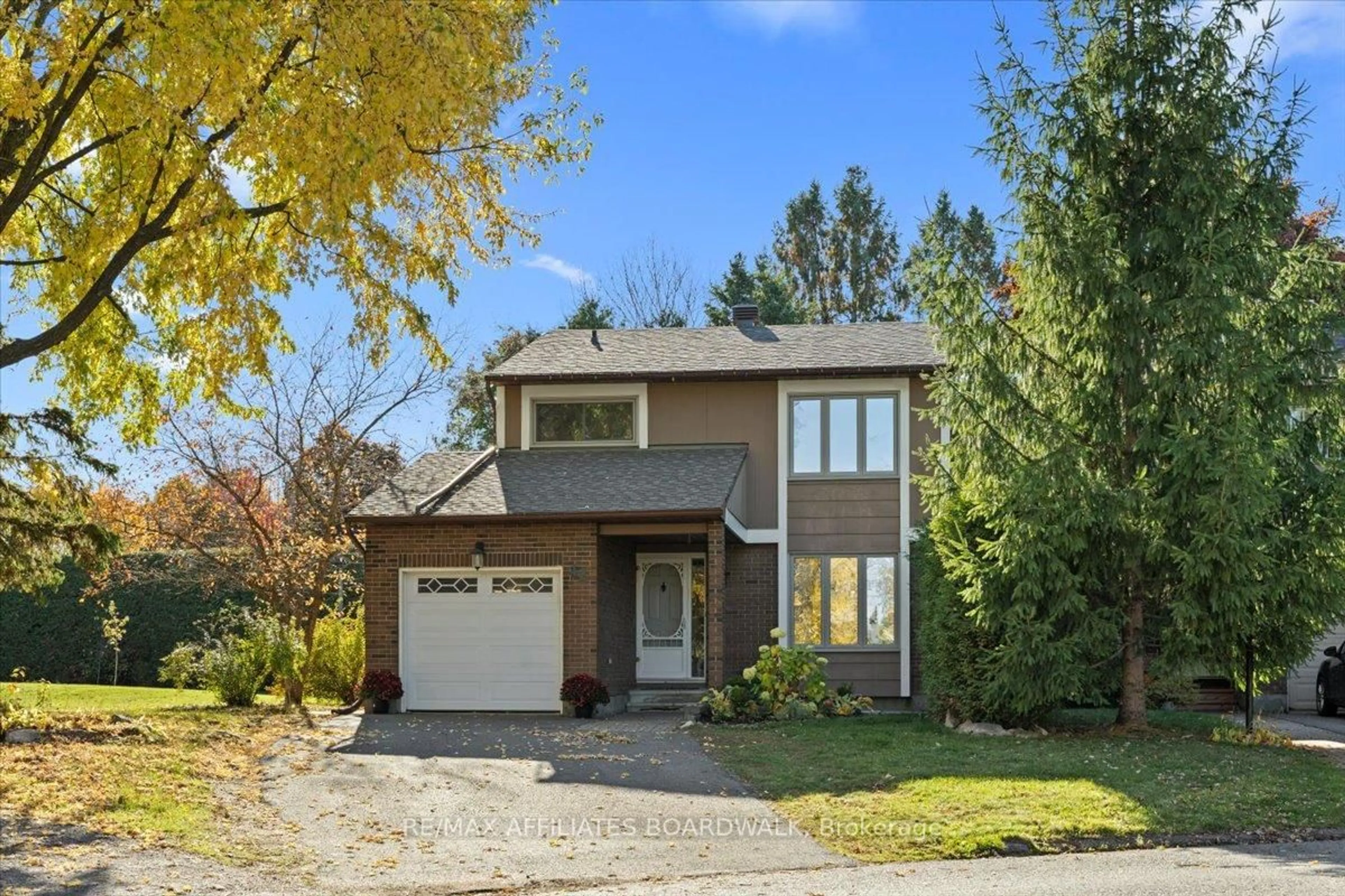 Home with brick exterior material, street for 42 Haywood Cres, Ottawa Ontario K2L 2J2