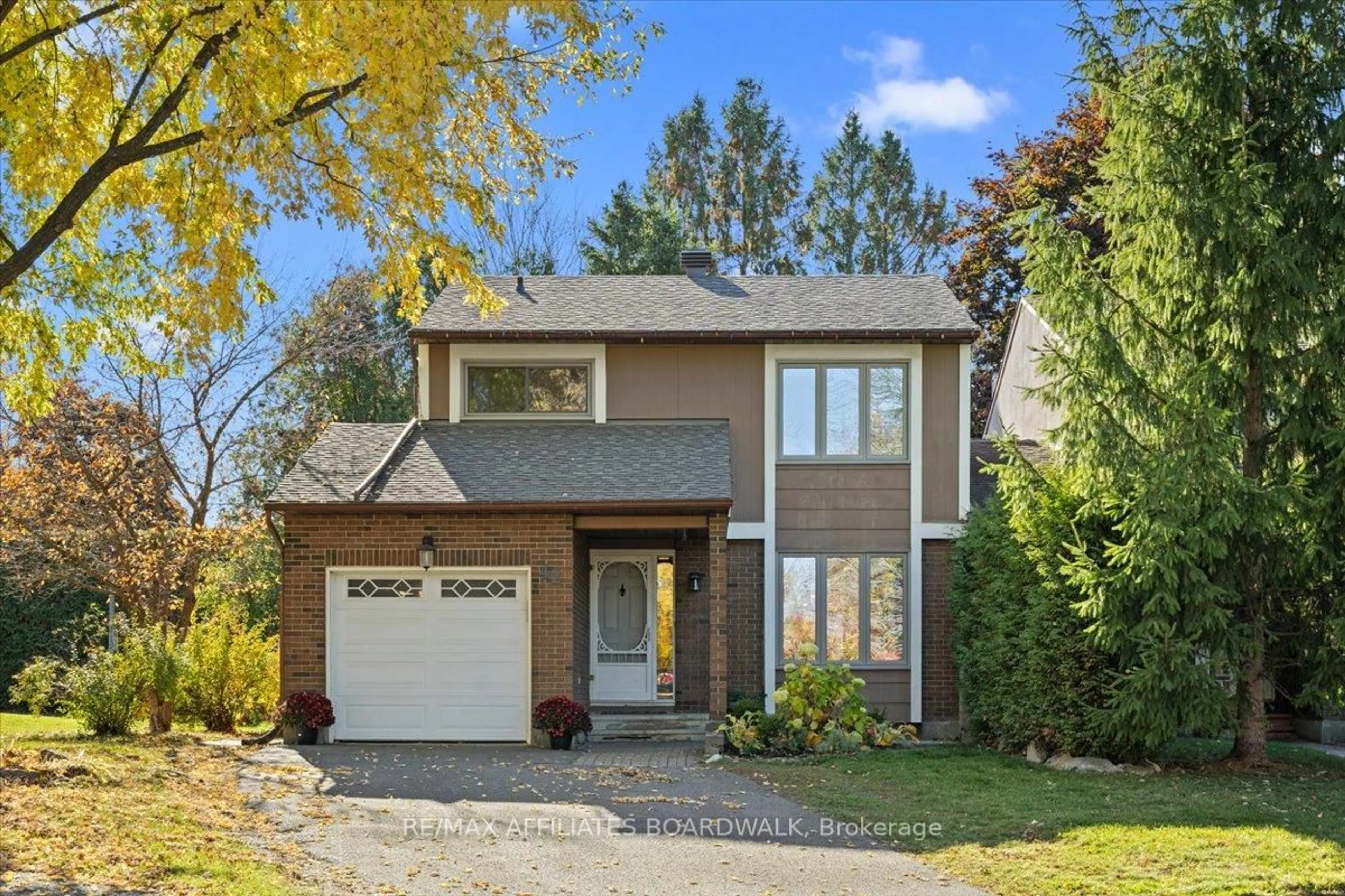 Home with brick exterior material, street for 42 Haywood Cres, Ottawa Ontario K2L 2J2