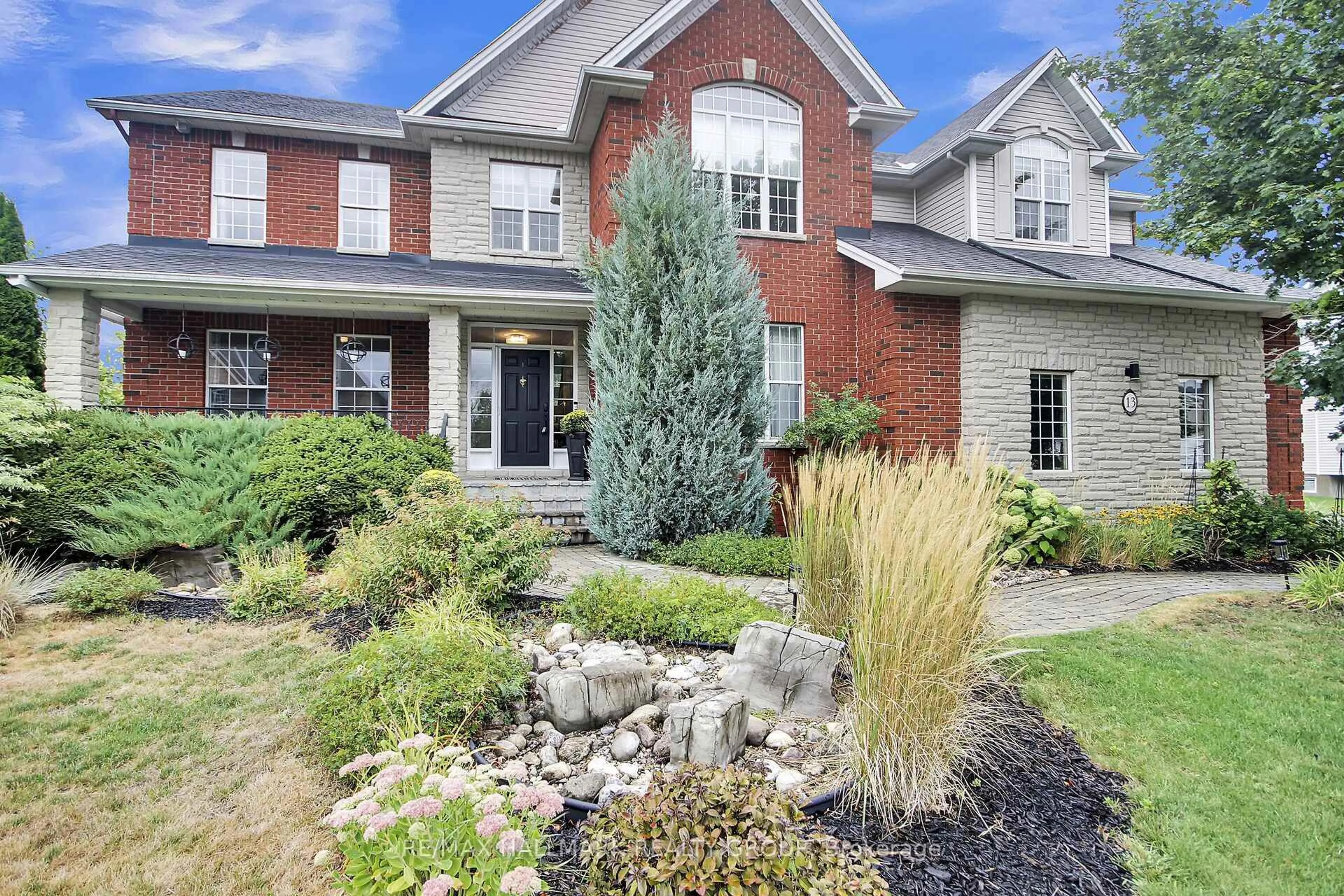 Home with brick exterior material, street for 13 Beechgrove Gdns, Stittsville Ontario K2S 1W5
