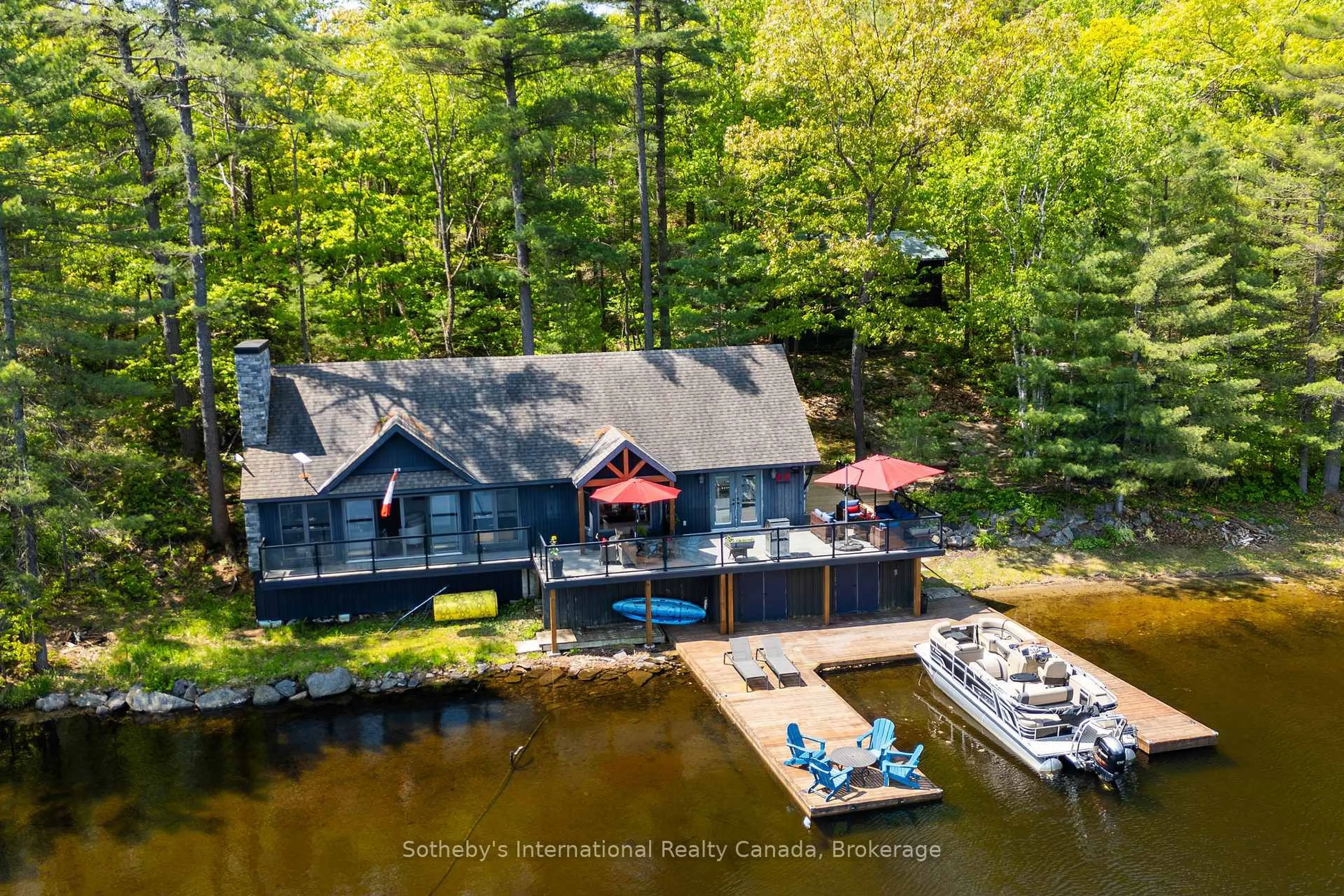 A pic from outside/outdoor area/front of a property/back of a property/a pic from drone, water/lake/river/ocean view for 6394 Go Home Lake Shore, Georgian Bay Ontario L0K 1S0