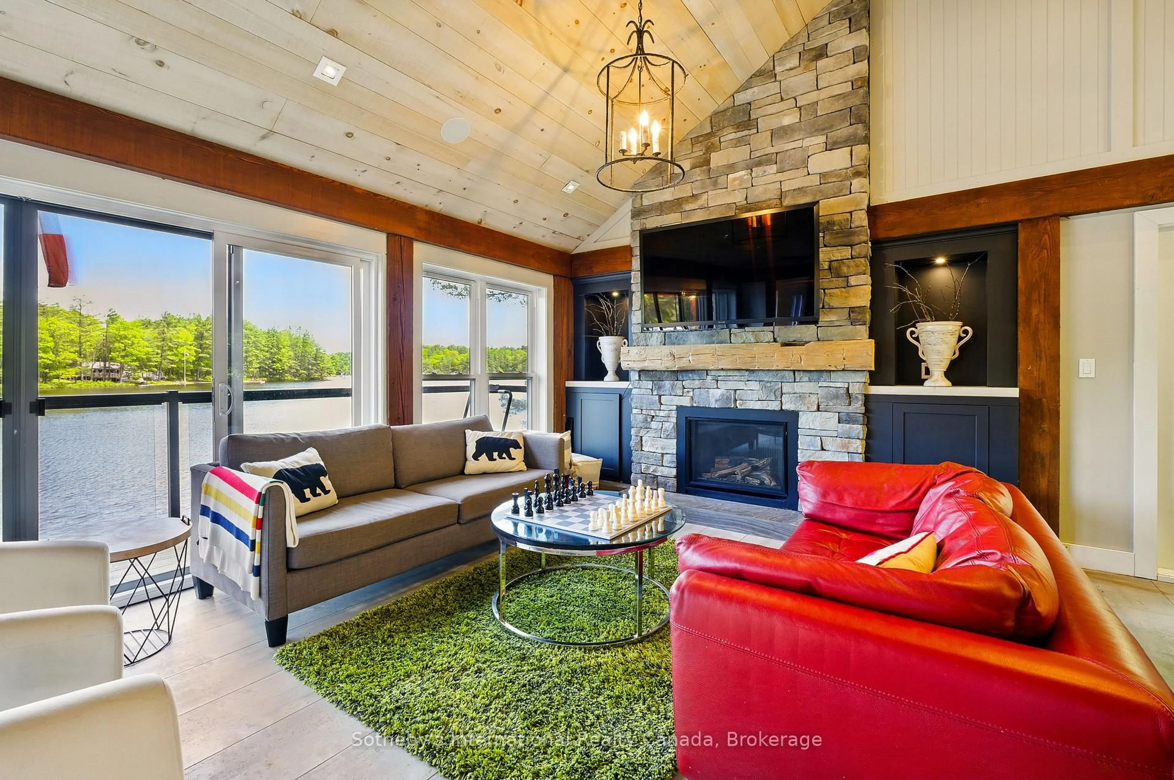 Living room with furniture, unknown for 6394 Go Home Lake Shore, Georgian Bay Ontario L0K 1S0