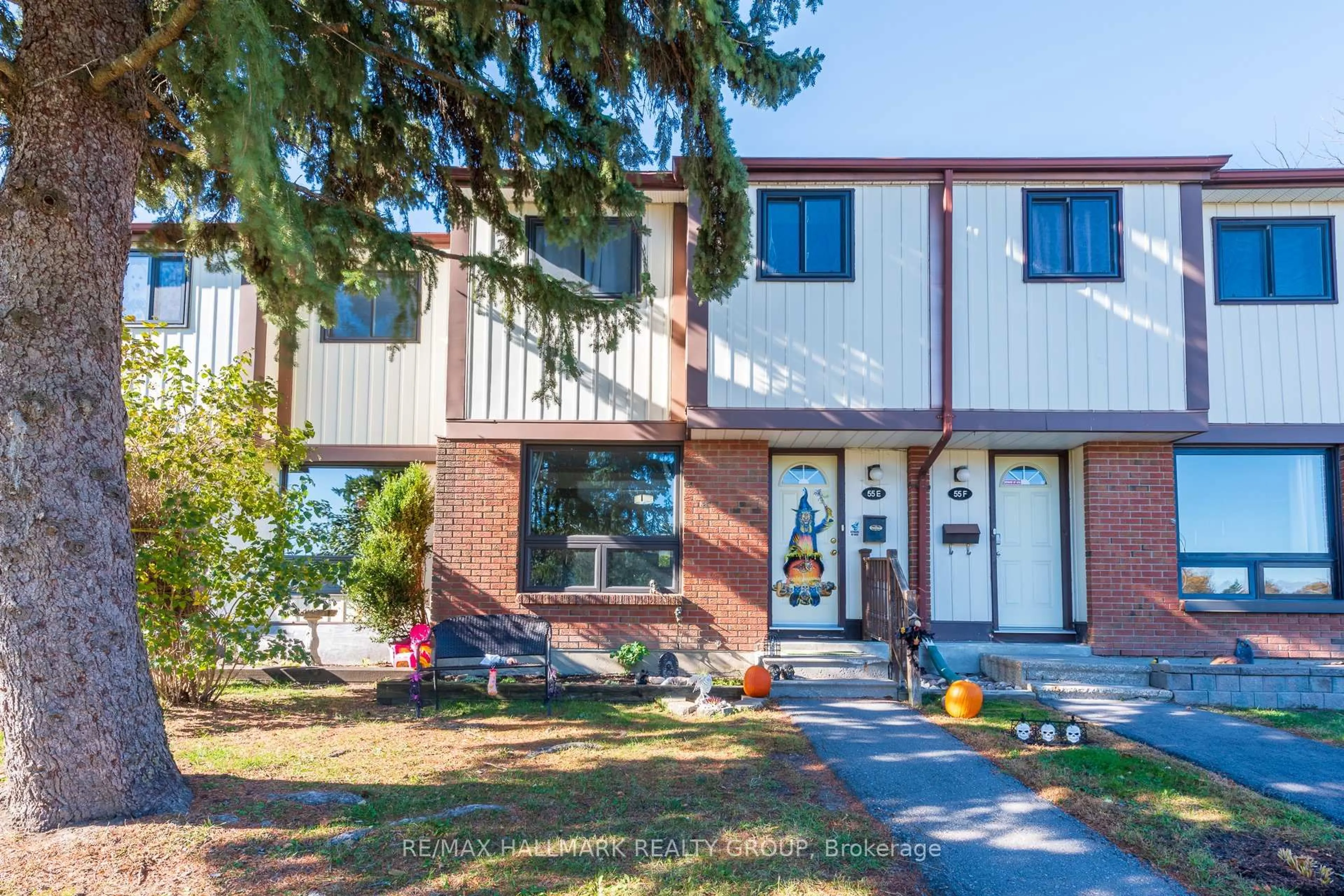 Home with vinyl exterior material, street for 55E Foxfield Dr #11, Ottawa Ontario K2J 1L7