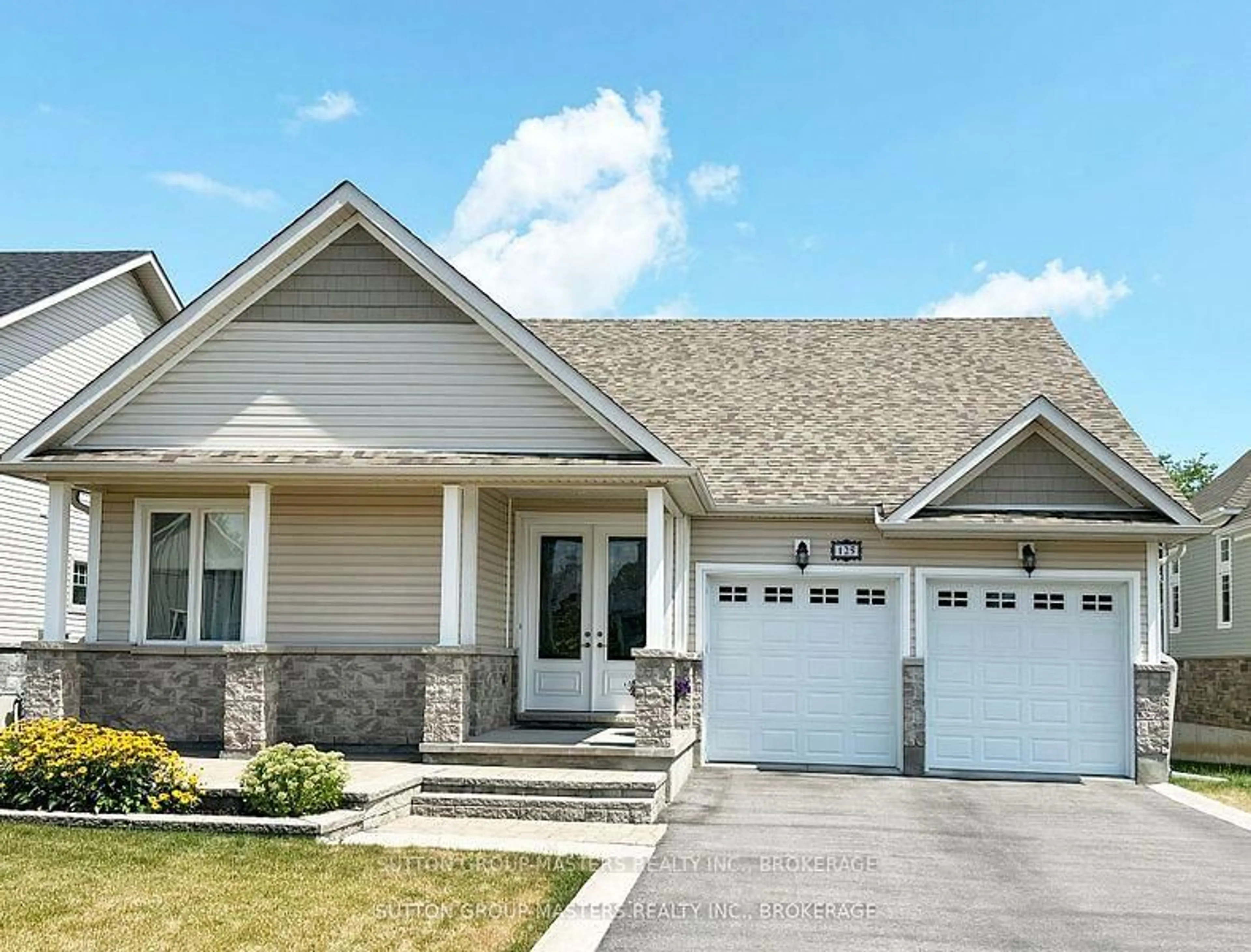 Home with vinyl exterior material, street for 125 Country Club Dr, Bath Ontario K0H 1G0