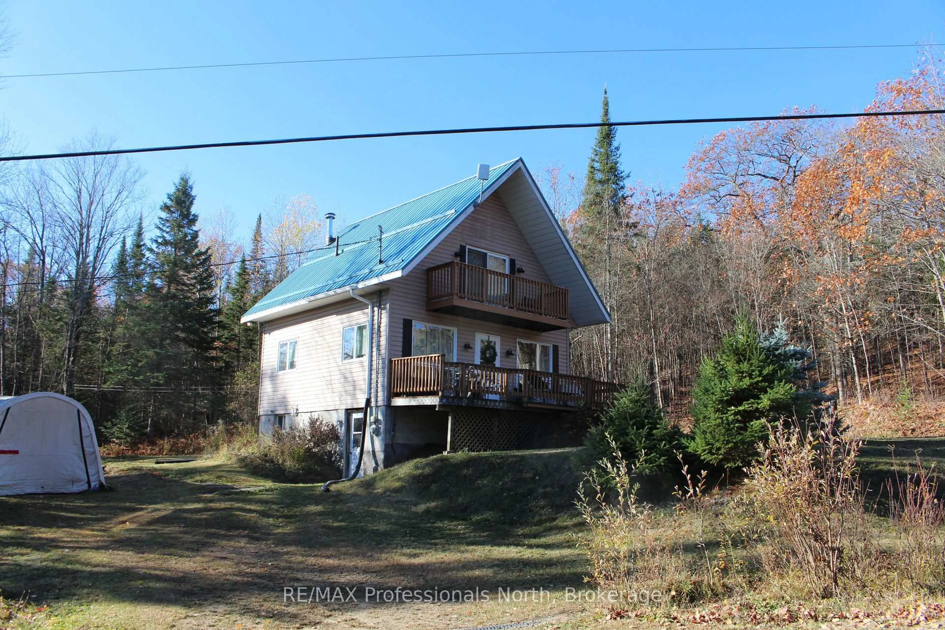 A pic from outside/outdoor area/front of a property/back of a property/a pic from drone, building for 1121 Old Donald Rd, Dysart et al Ontario K0M 1S0