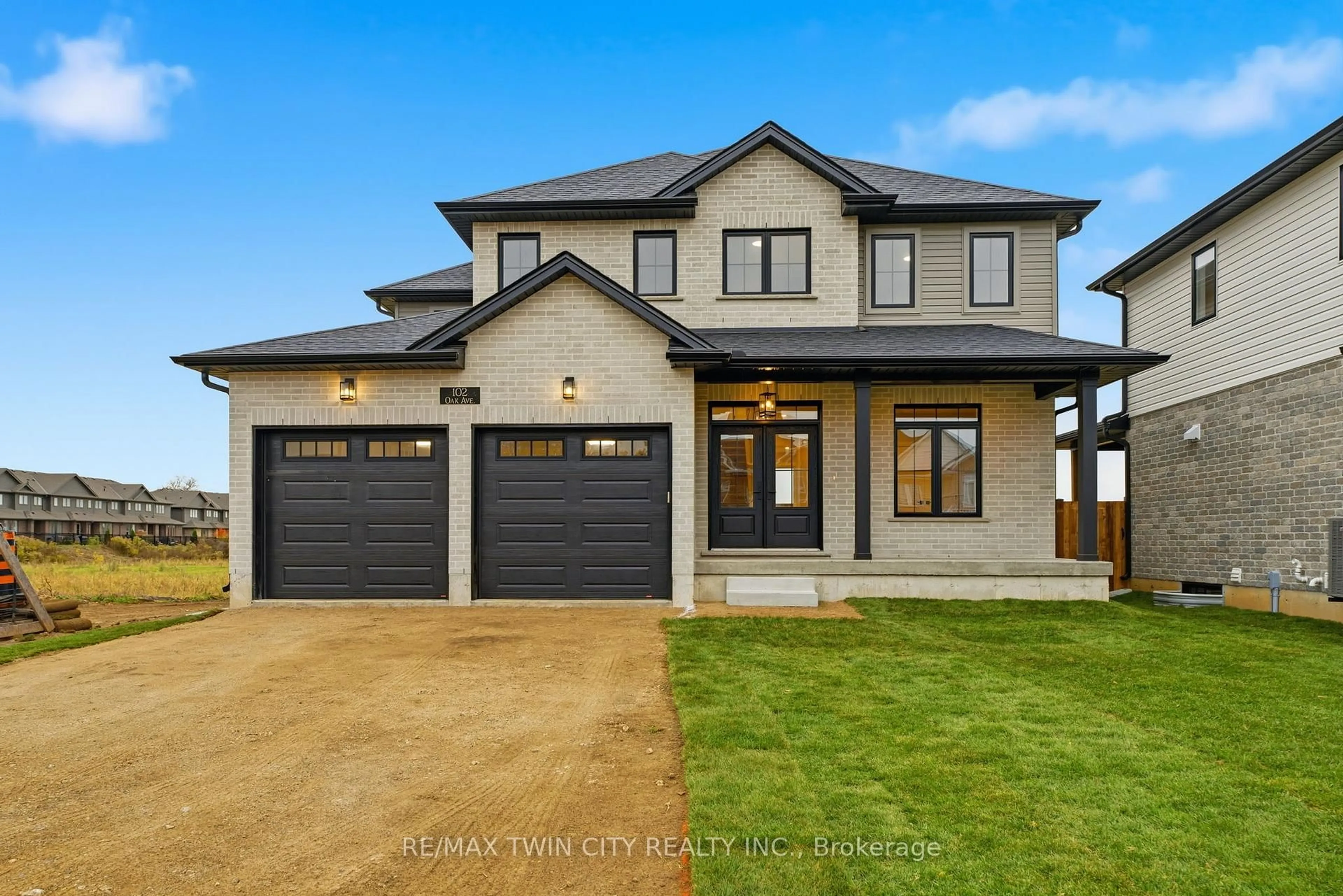 Home with brick exterior material, street for 102 Oak Ave, Brant Ontario N3L 0J6