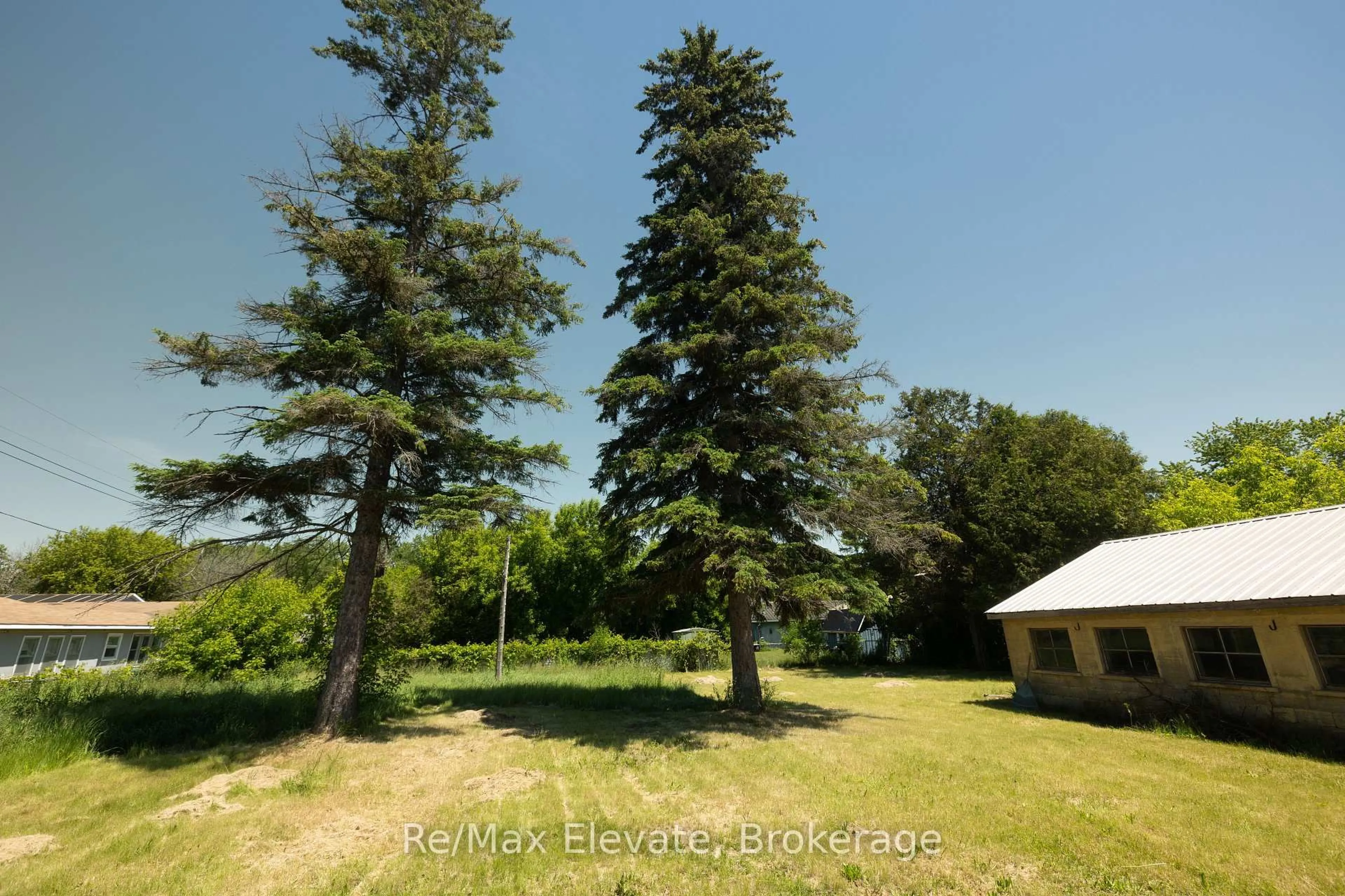 A pic from outside/outdoor area/front of a property/back of a property/a pic from drone, forest/trees view for 106 Whites Rd, Quinte West Ontario K8V 5P5