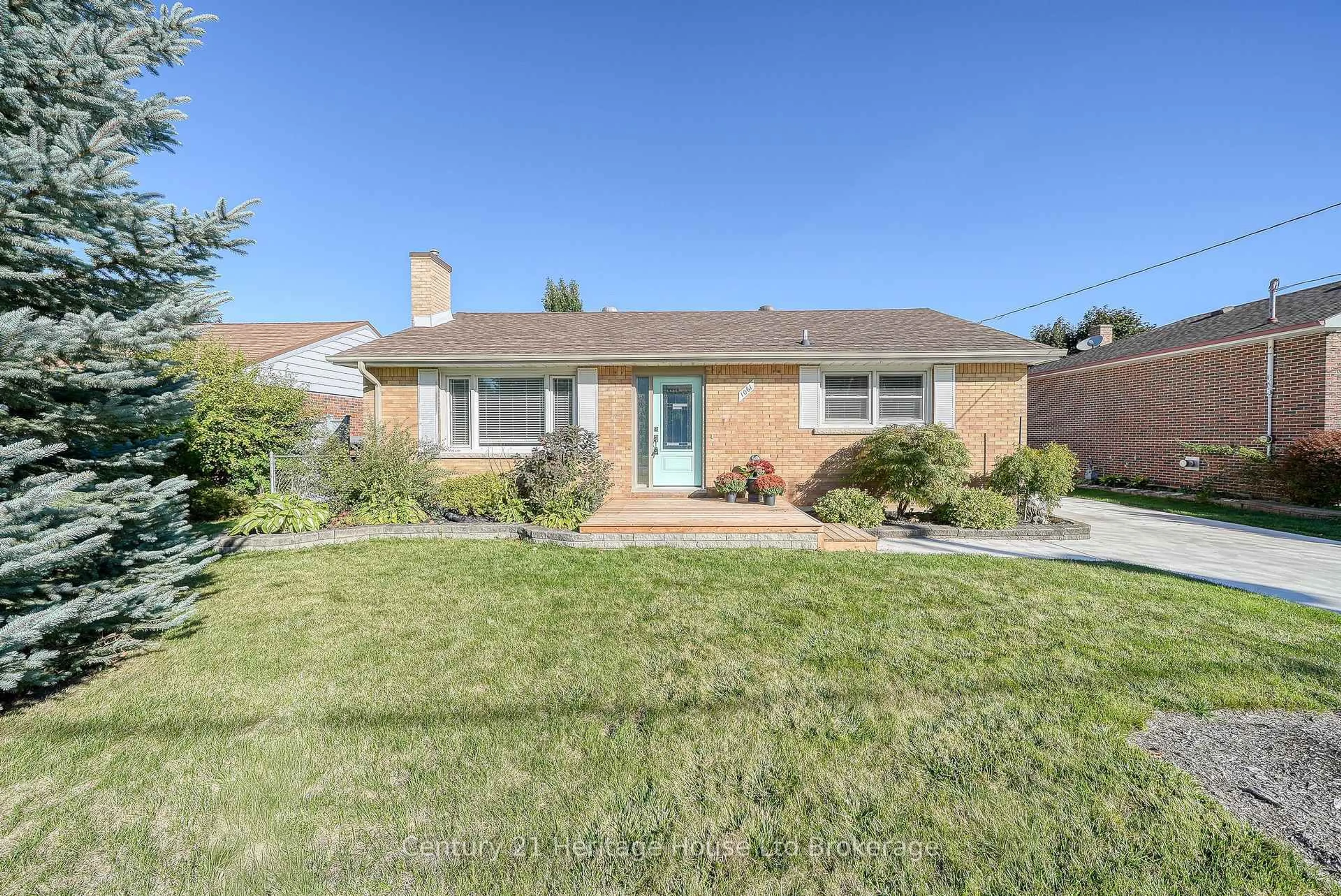 Home with brick exterior material, street for 1061 Elora Rd, Woodstock Ontario N4S 5L9