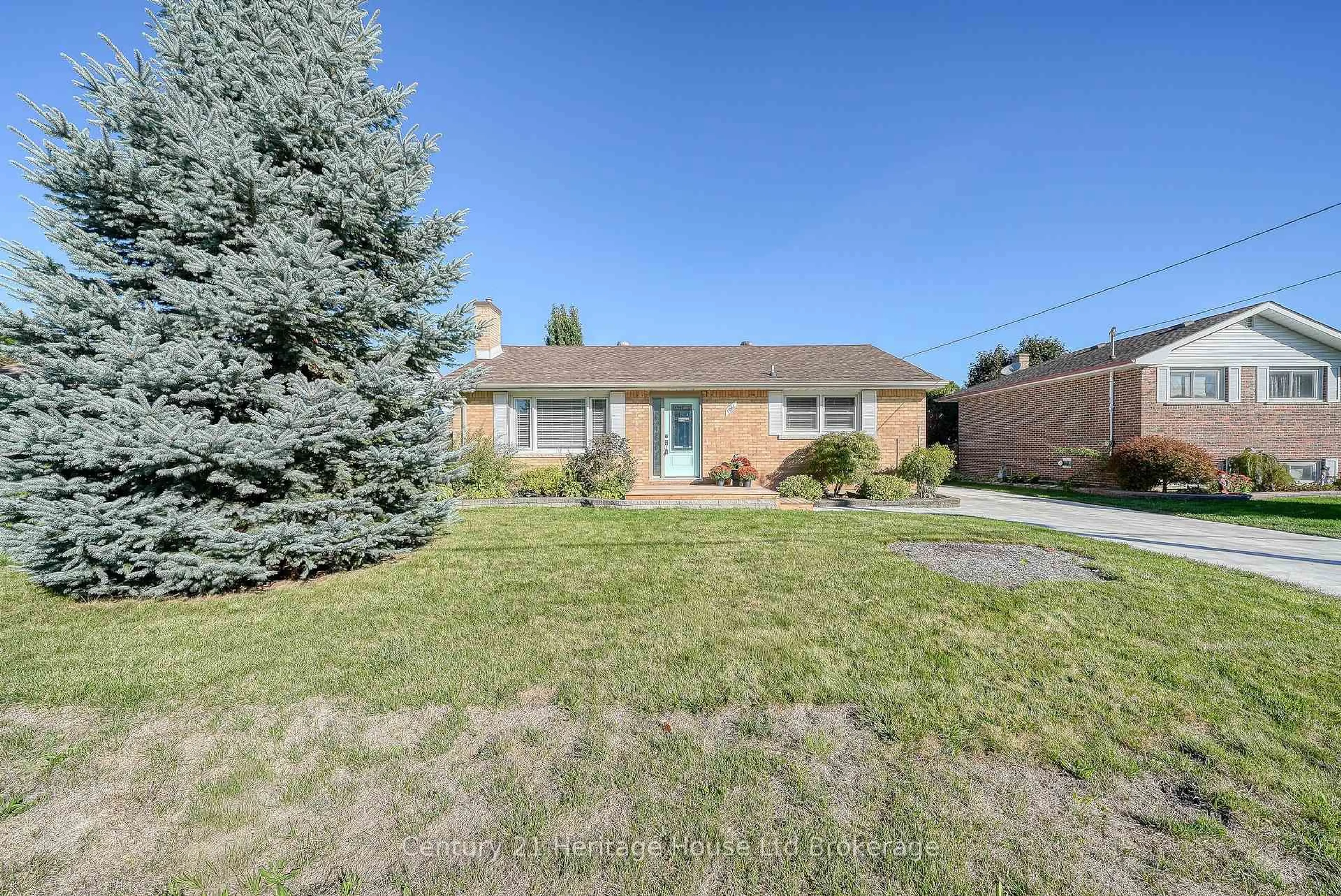 Home with brick exterior material, street for 1061 Elora Rd, Woodstock Ontario N4S 5L9