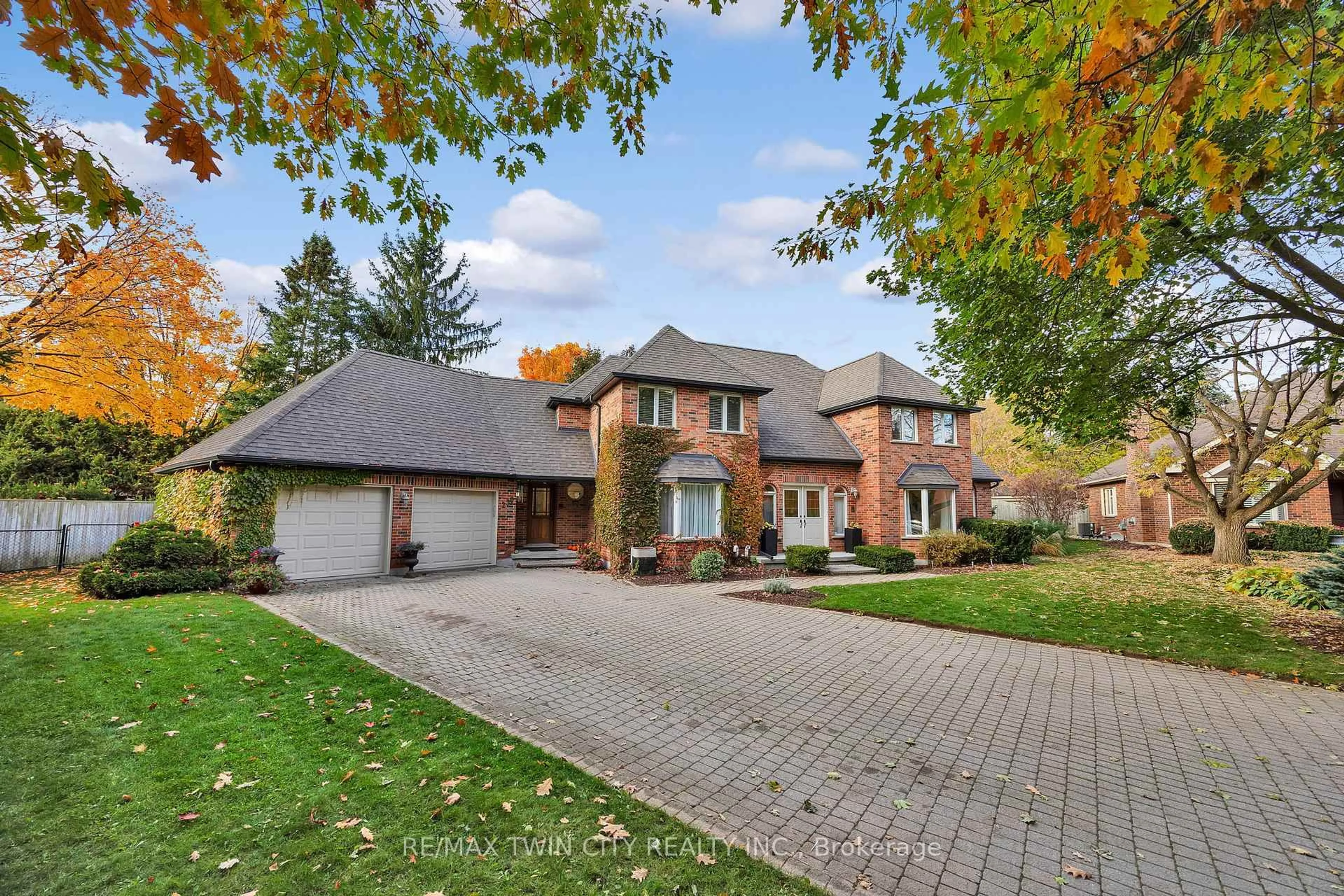 Home with brick exterior material, street for 250 Grey Squirrel Pl, Waterloo Ontario N2K 3H9