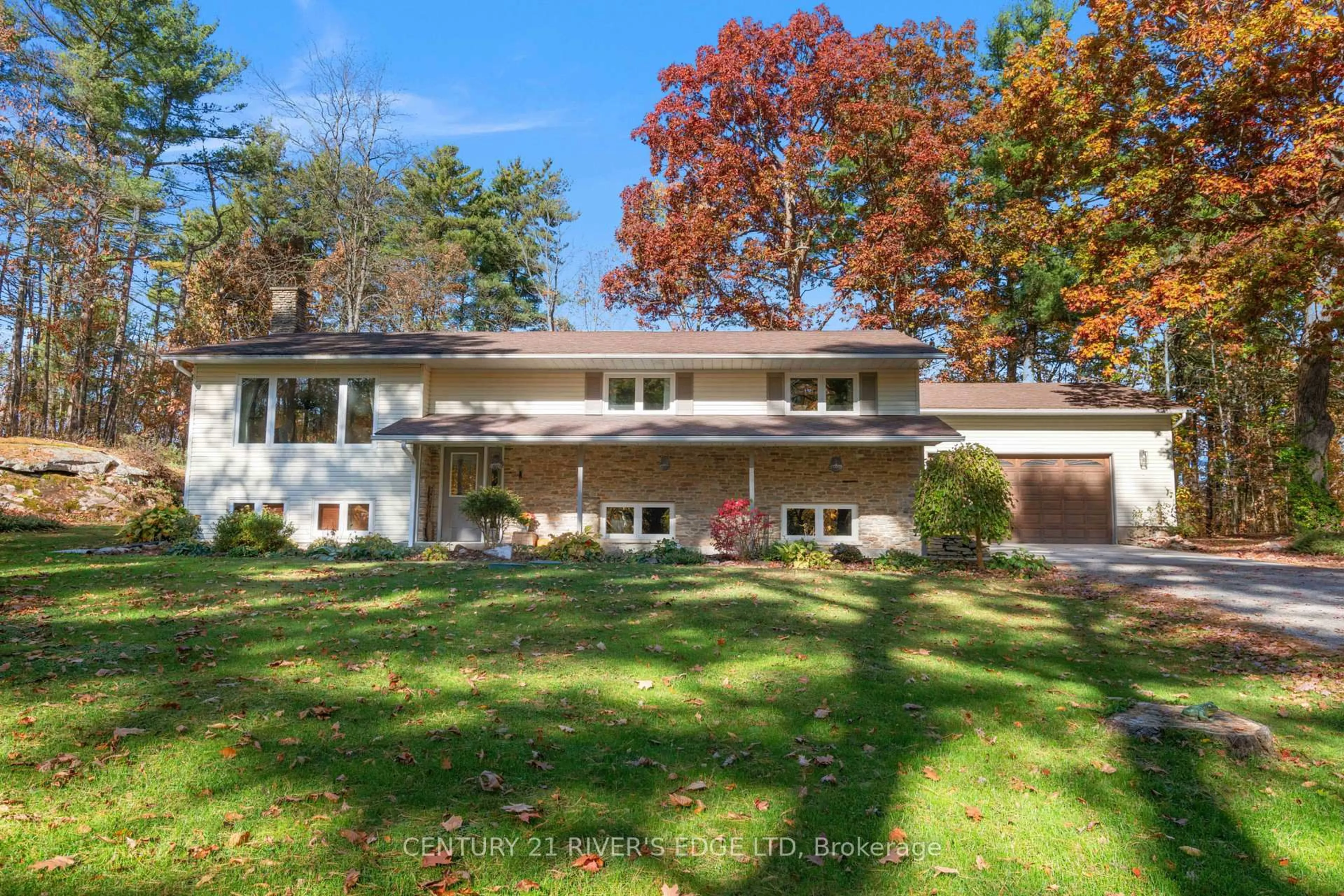 Home with vinyl exterior material, street for 386 Old River Rd, Front of Yonge Ontario K0E 1R0