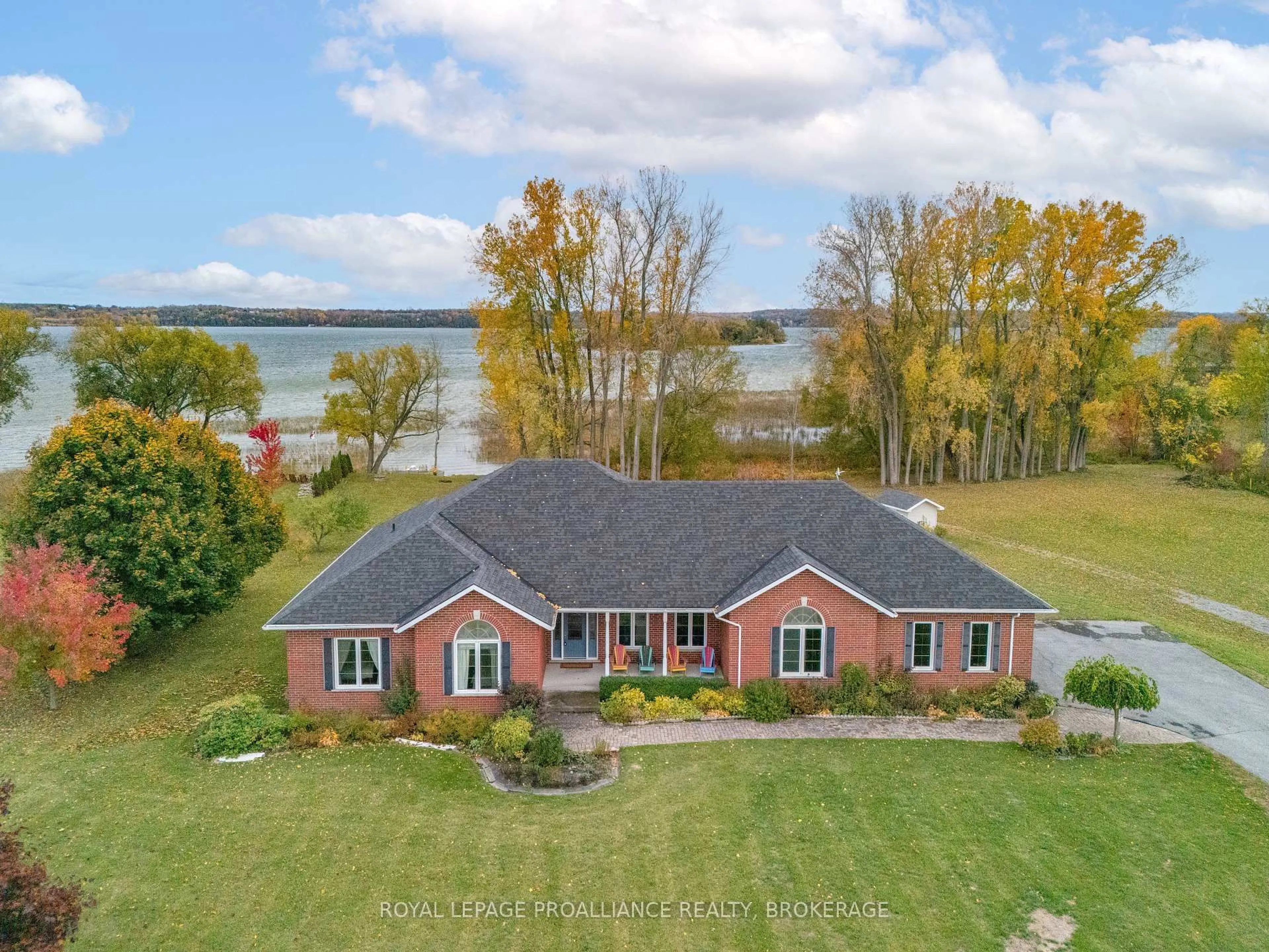 A pic from outside/outdoor area/front of a property/back of a property/a pic from drone, water/lake/river/ocean view for 116 Schenk St, Bath Ontario K0H 1G0
