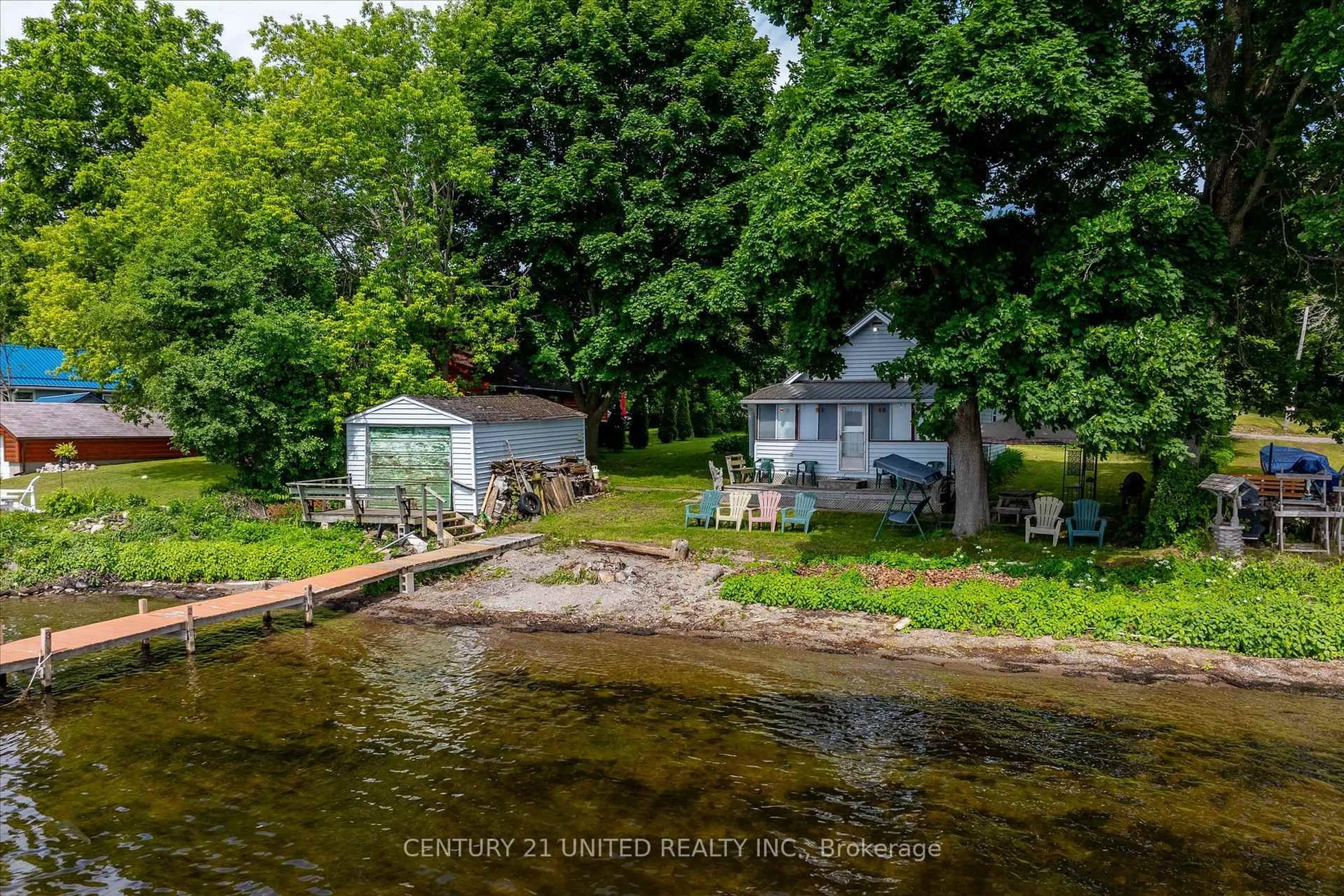 A pic from outside/outdoor area/front of a property/back of a property/a pic from drone, water/lake/river/ocean view for 223 Paudash St, Hiawatha First Nation Ontario K0L 2G0