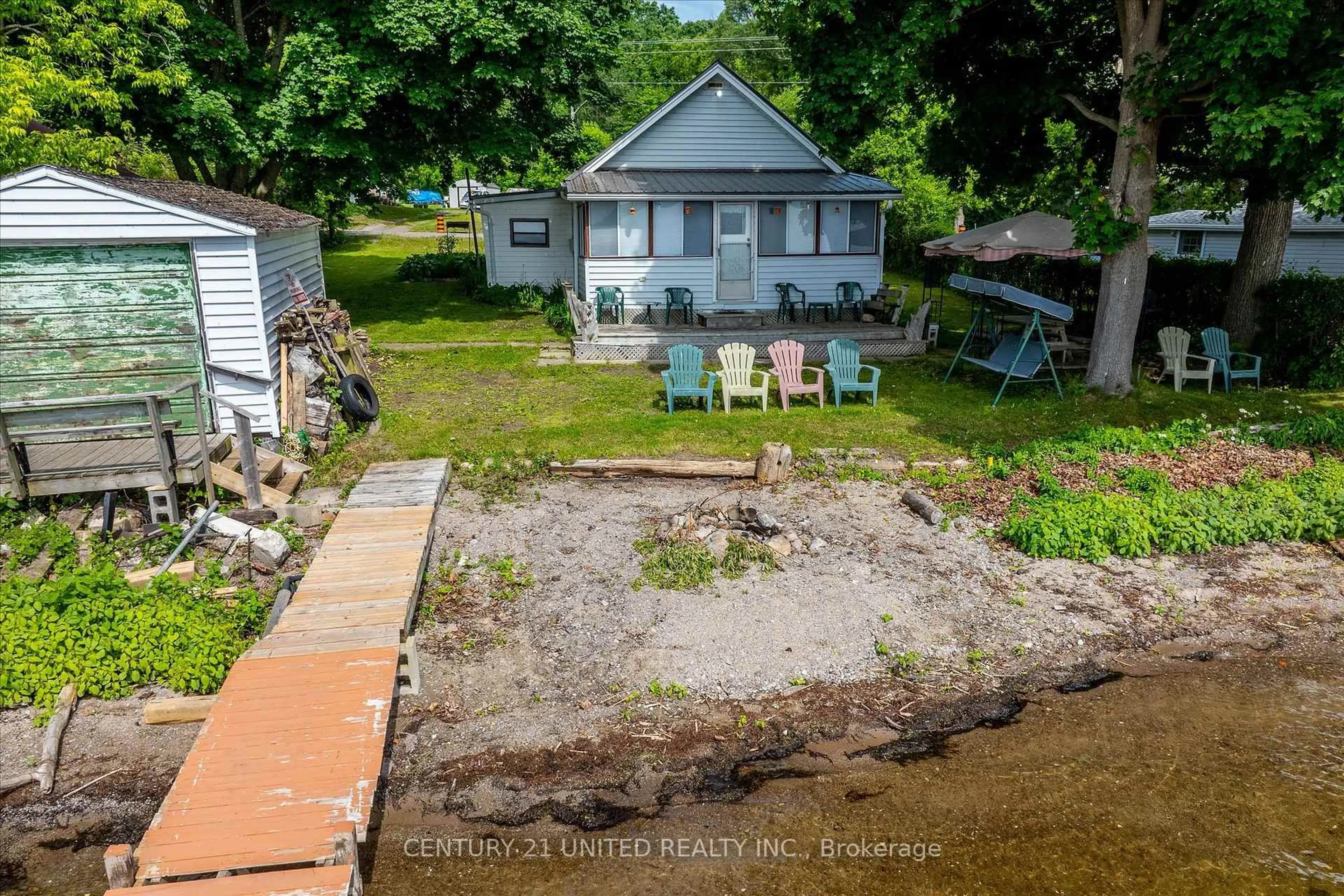 A pic from outside/outdoor area/front of a property/back of a property/a pic from drone, water/lake/river/ocean view for 223 Paudash St, Hiawatha First Nation Ontario K0L 2G0