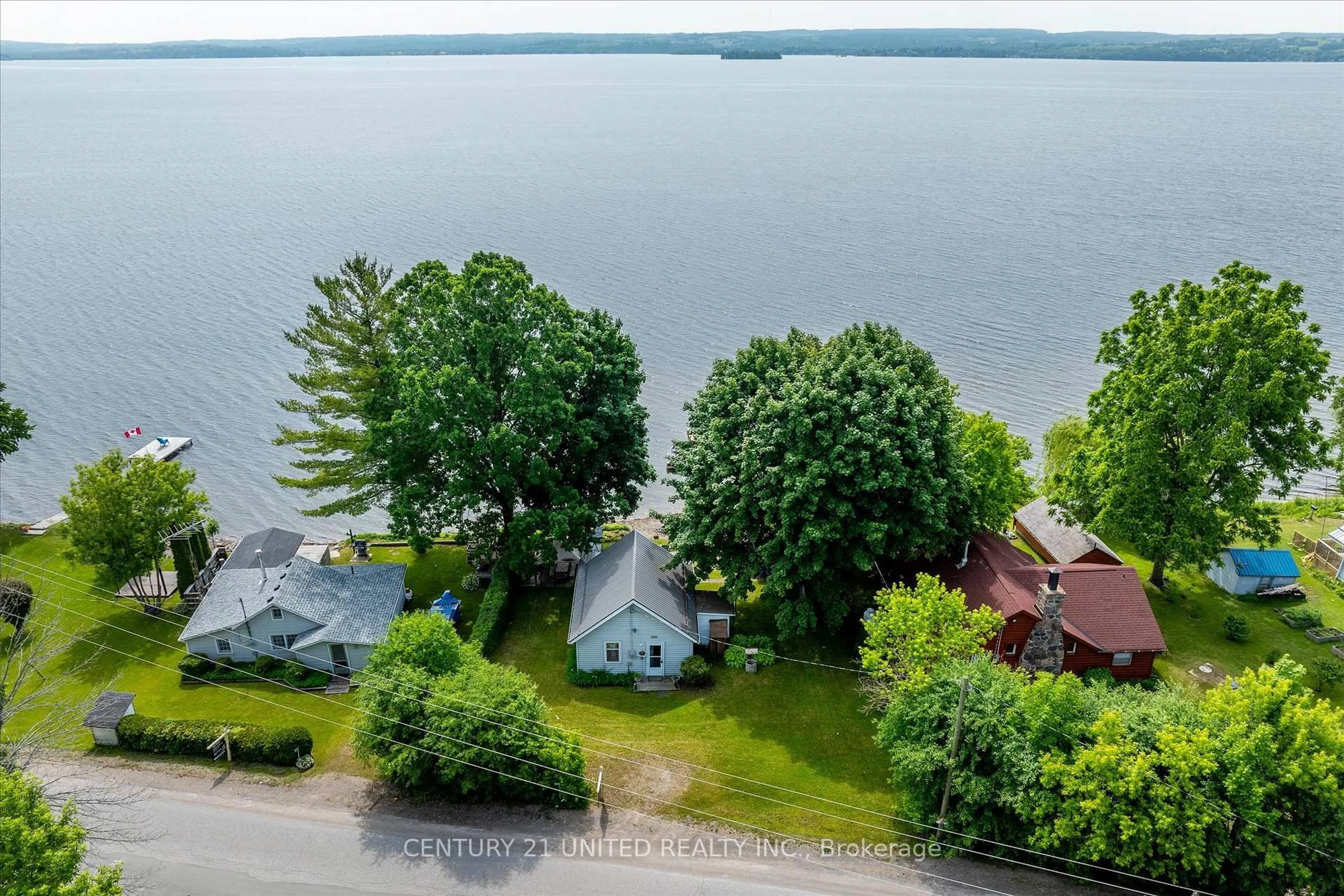 A pic from outside/outdoor area/front of a property/back of a property/a pic from drone, water/lake/river/ocean view for 223 Paudash St, Hiawatha First Nation Ontario K0L 2G0