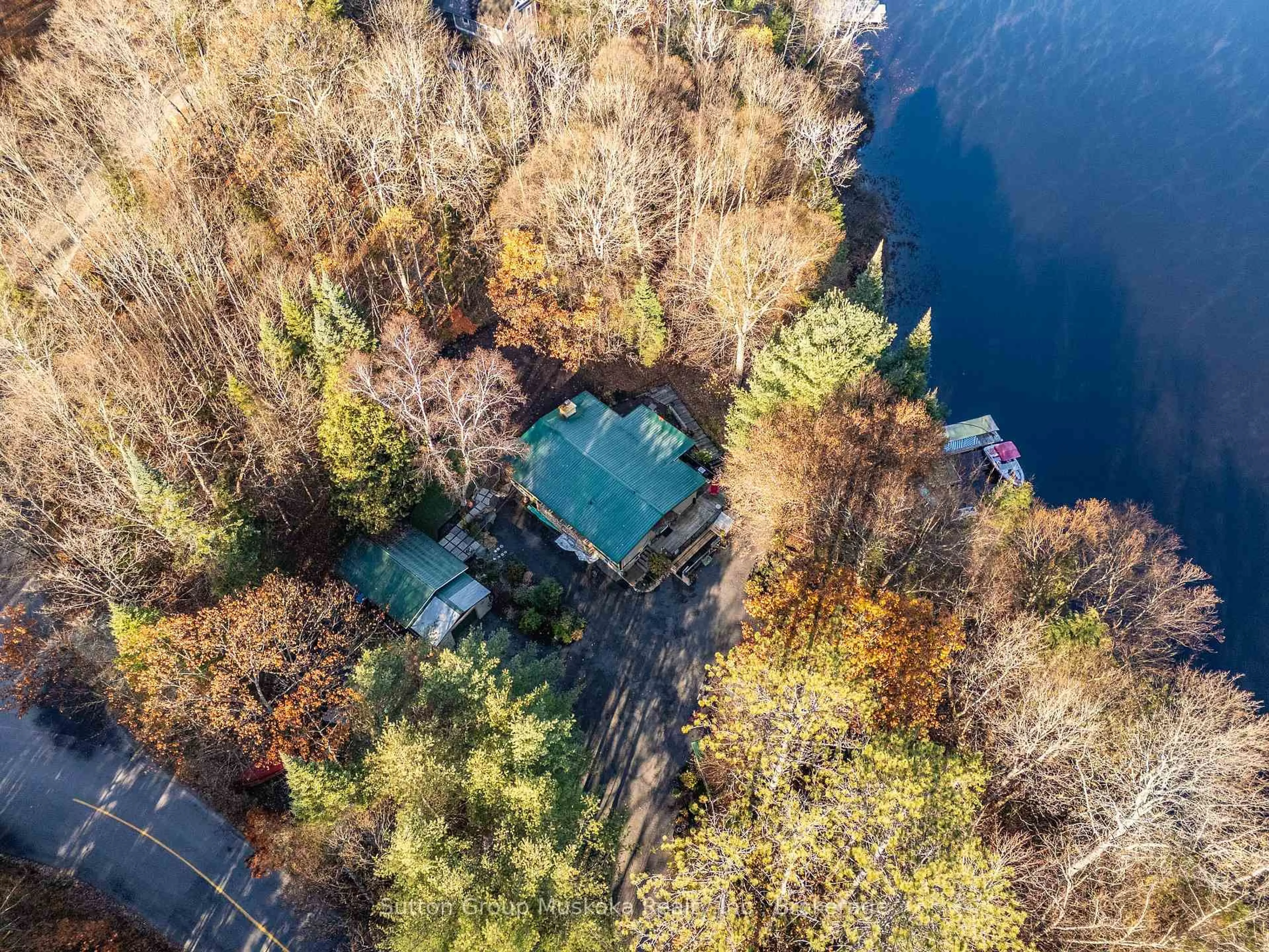 A pic from outside/outdoor area/front of a property/back of a property/a pic from drone, water/lake/river/ocean view for 236 Hoodstown Rd, Huntsville Ontario P1H 2J2