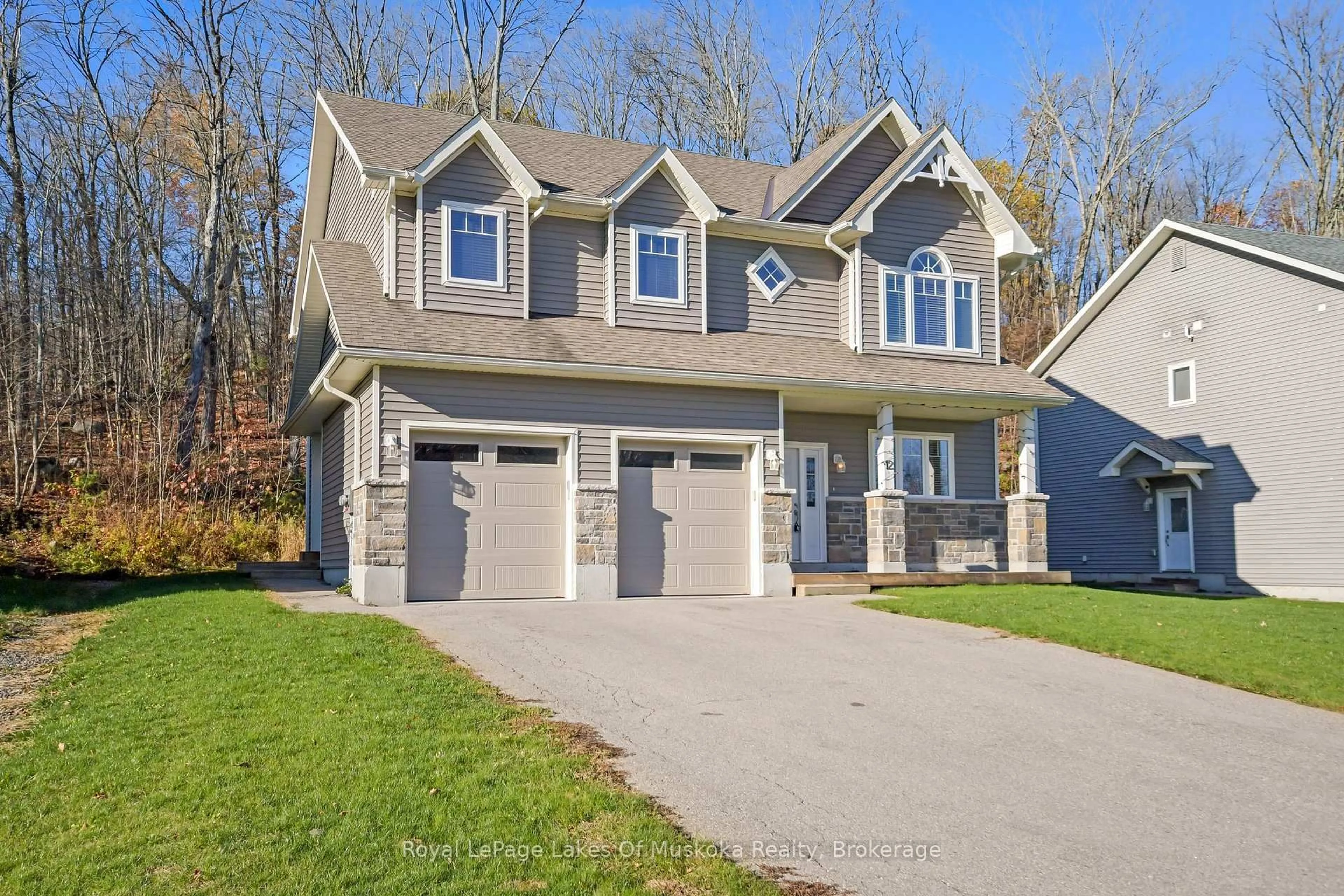 Home with vinyl exterior material, street for 12 MacArthur Dr, Bracebridge Ontario P1L 0A8