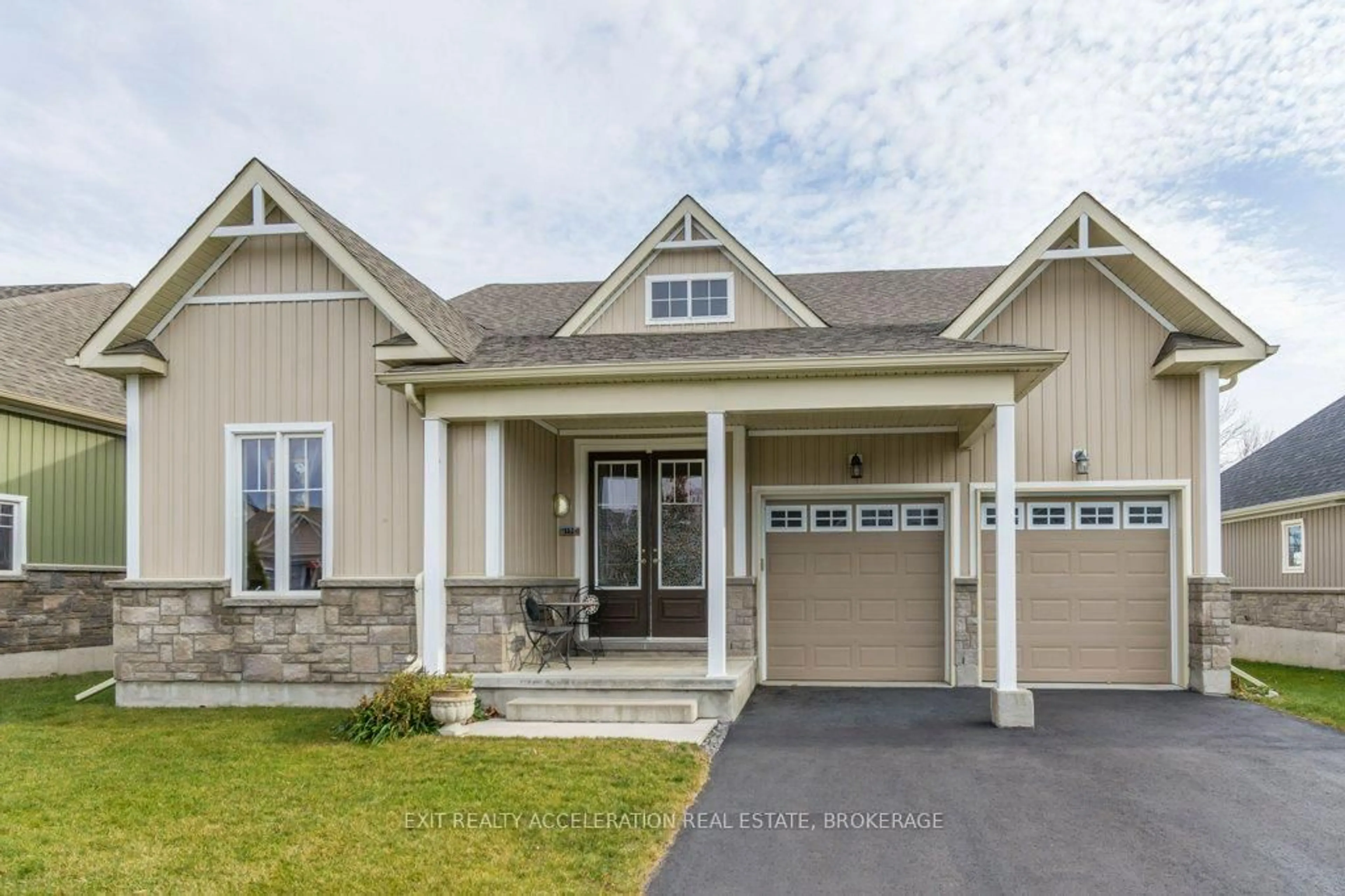 Home with vinyl exterior material, street for 113 Country Club Dr, Bath Ontario K0H 1G0
