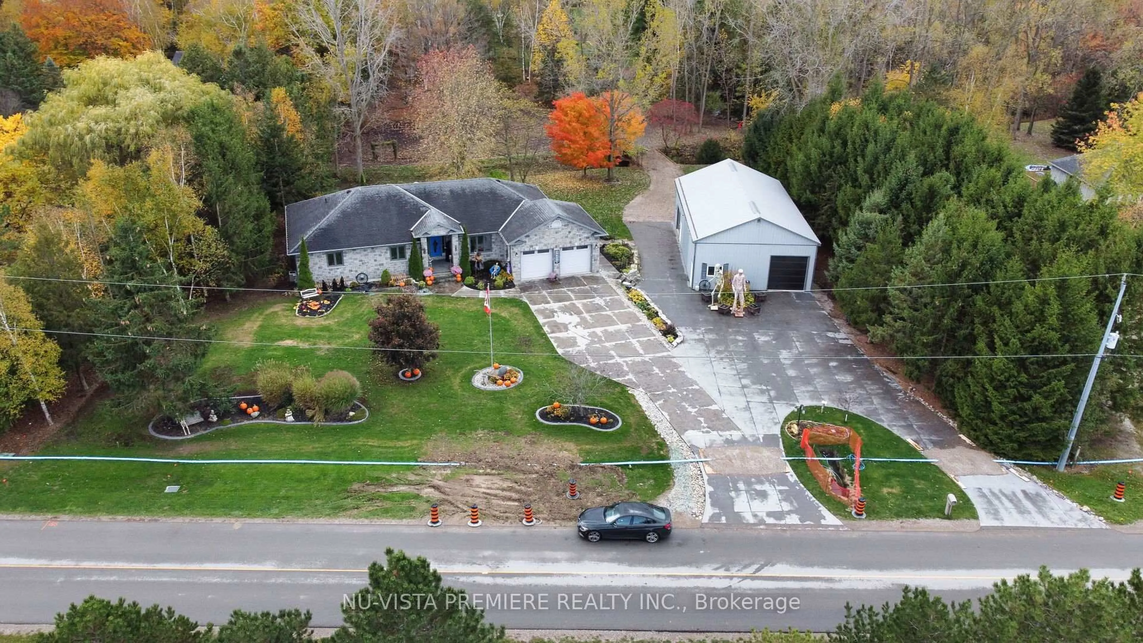 A pic from outside/outdoor area/front of a property/back of a property/a pic from drone, street for 36273 Gore Rd, South Huron Ontario N0M 1T0