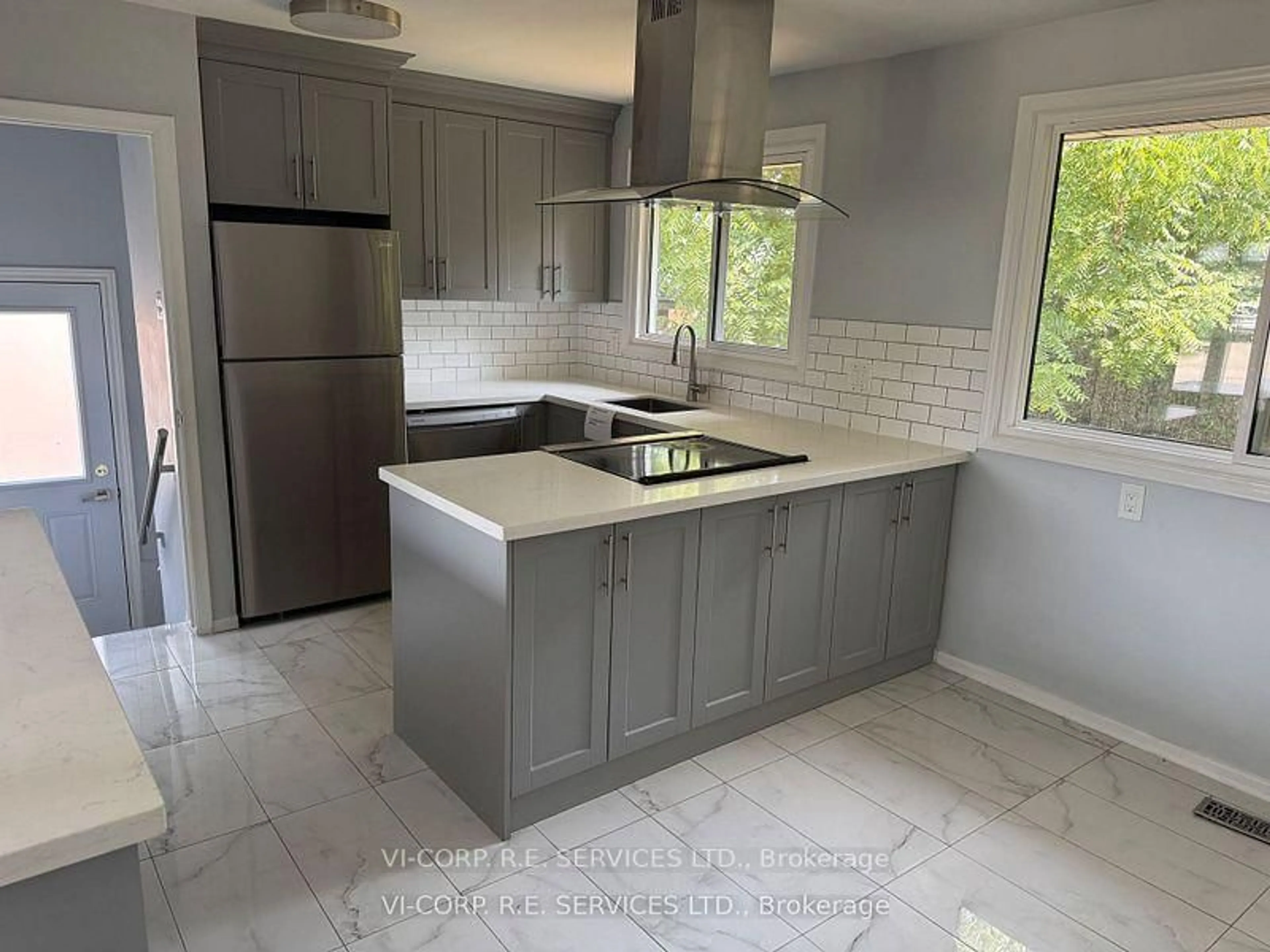 Open concept kitchen, ceramic/tile floor for 89 Greeningdon Dr, Hamilton Ontario L9A 3A8