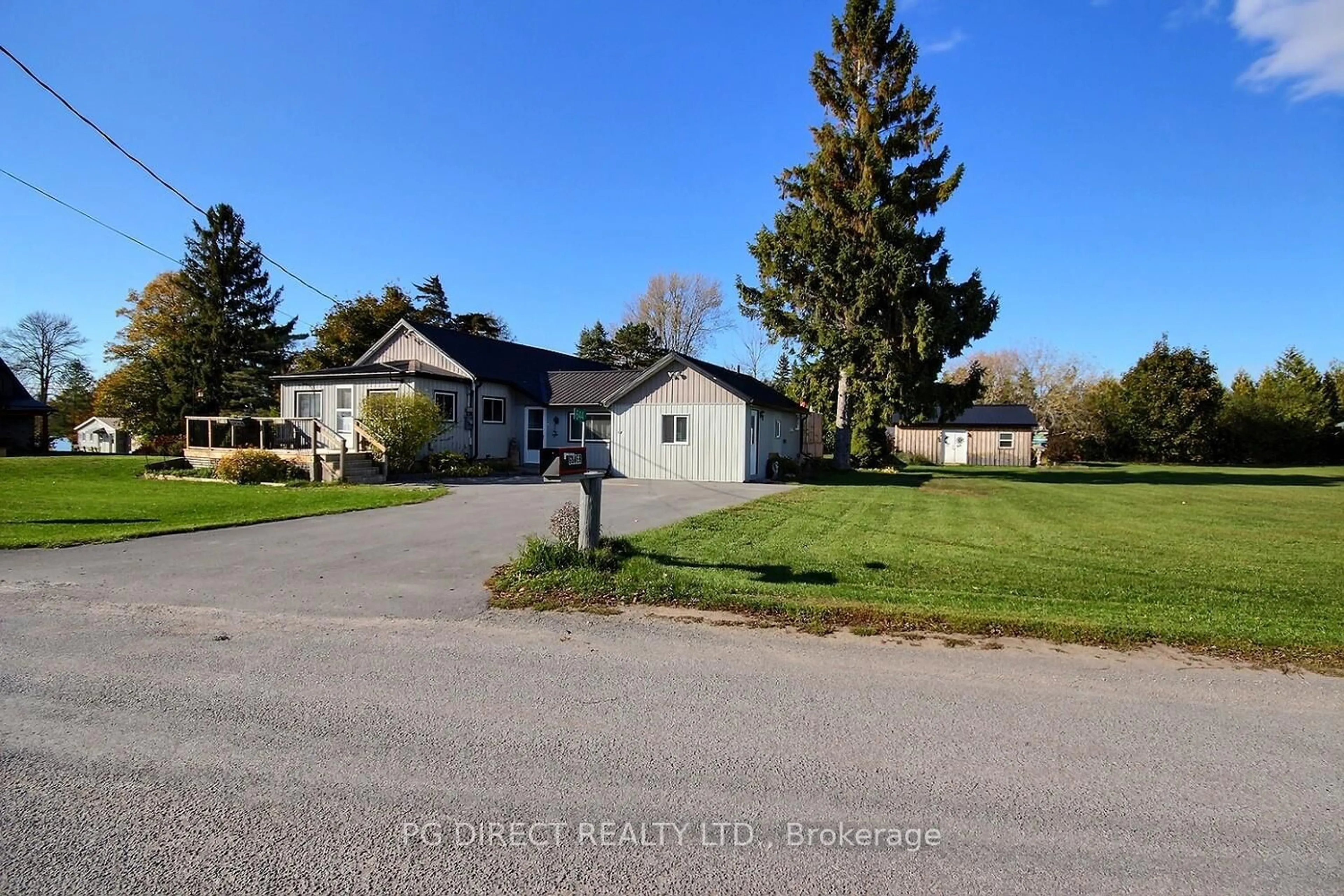 A pic from outside/outdoor area/front of a property/back of a property/a pic from drone, street for 644 Smokes Point Rd, Prince Edward County Ontario K0K 1L0