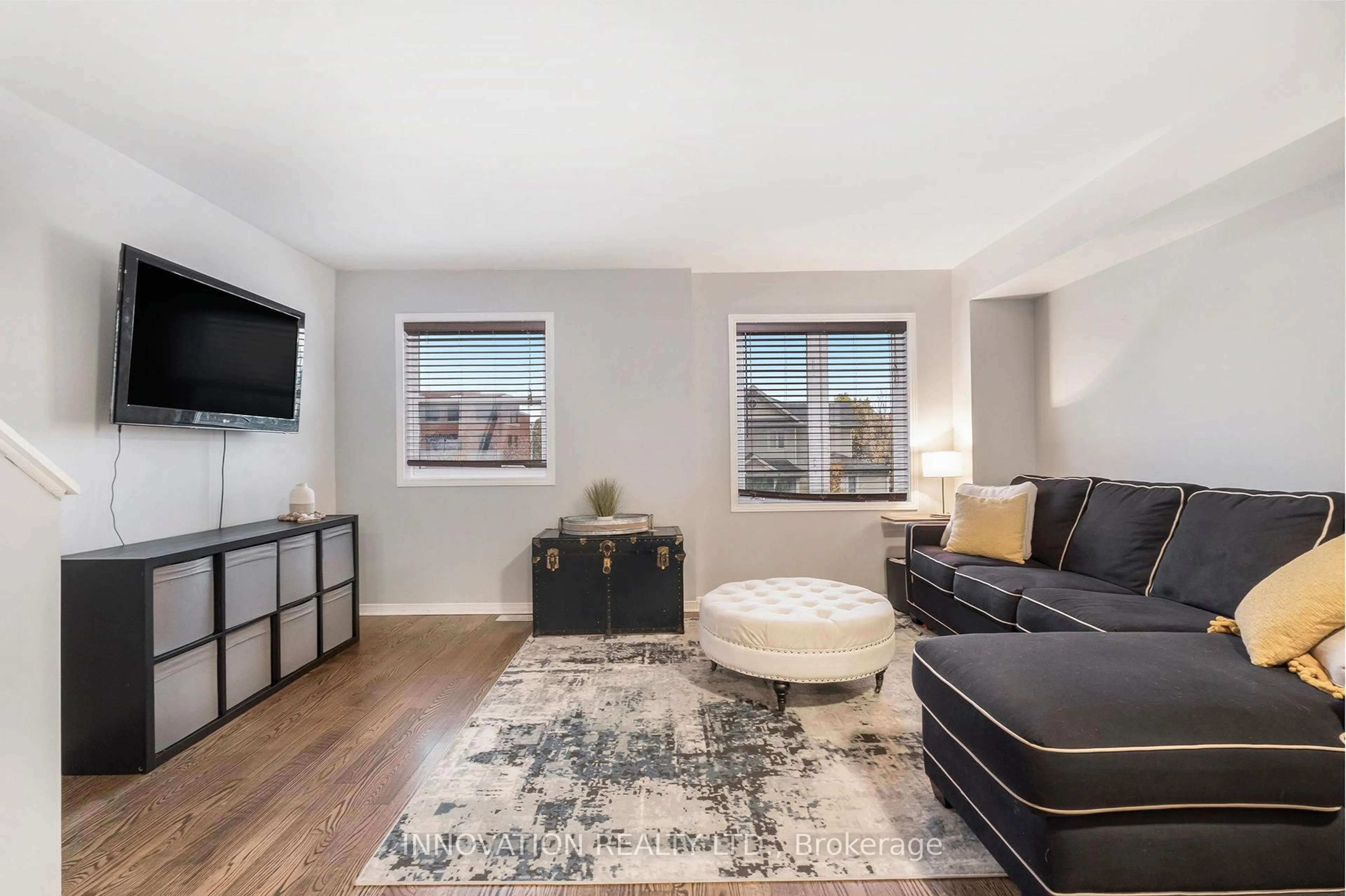 Living room with furniture, unknown for 203 Kennevale Dr, Ottawa Ontario K2J 0C3