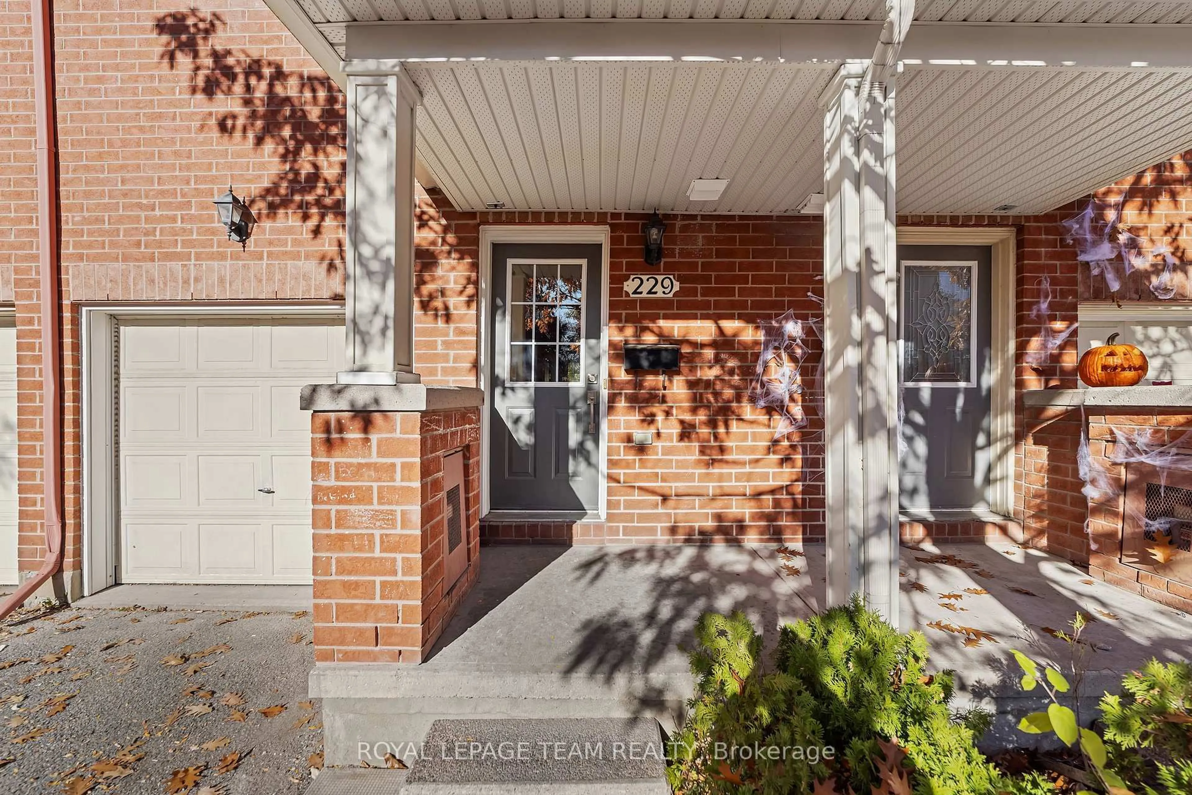 Home with brick exterior material, street for 90 Edenvale Dr #229, Kanata Ontario K2K 3N8