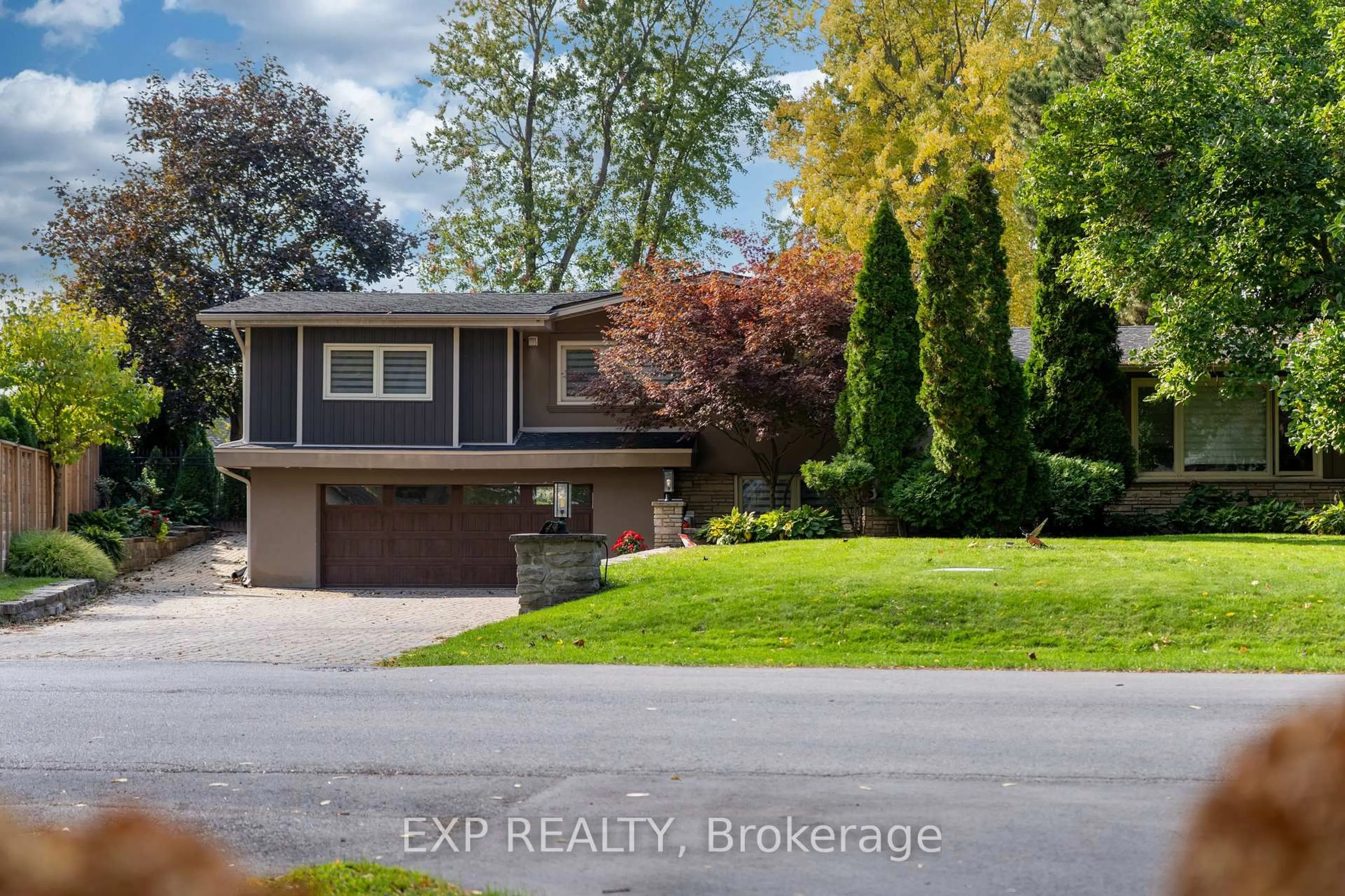 Home with vinyl exterior material, street for 49 Simpson Rd, St. Catharines Ontario L2N 3Z5