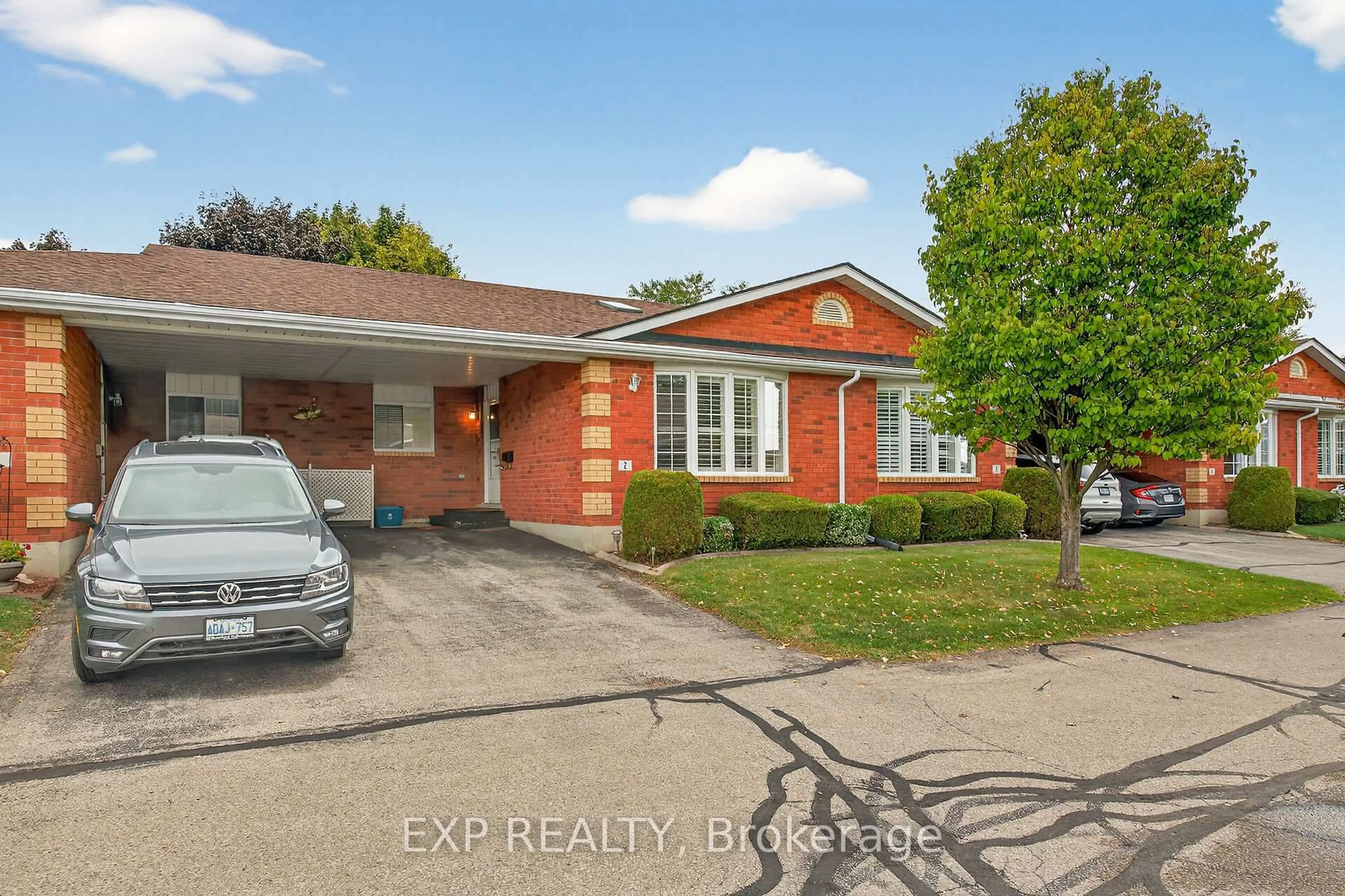 Home with brick exterior material, street for 20 Courtland Dr #2, Brantford Ontario N3R 7Y2