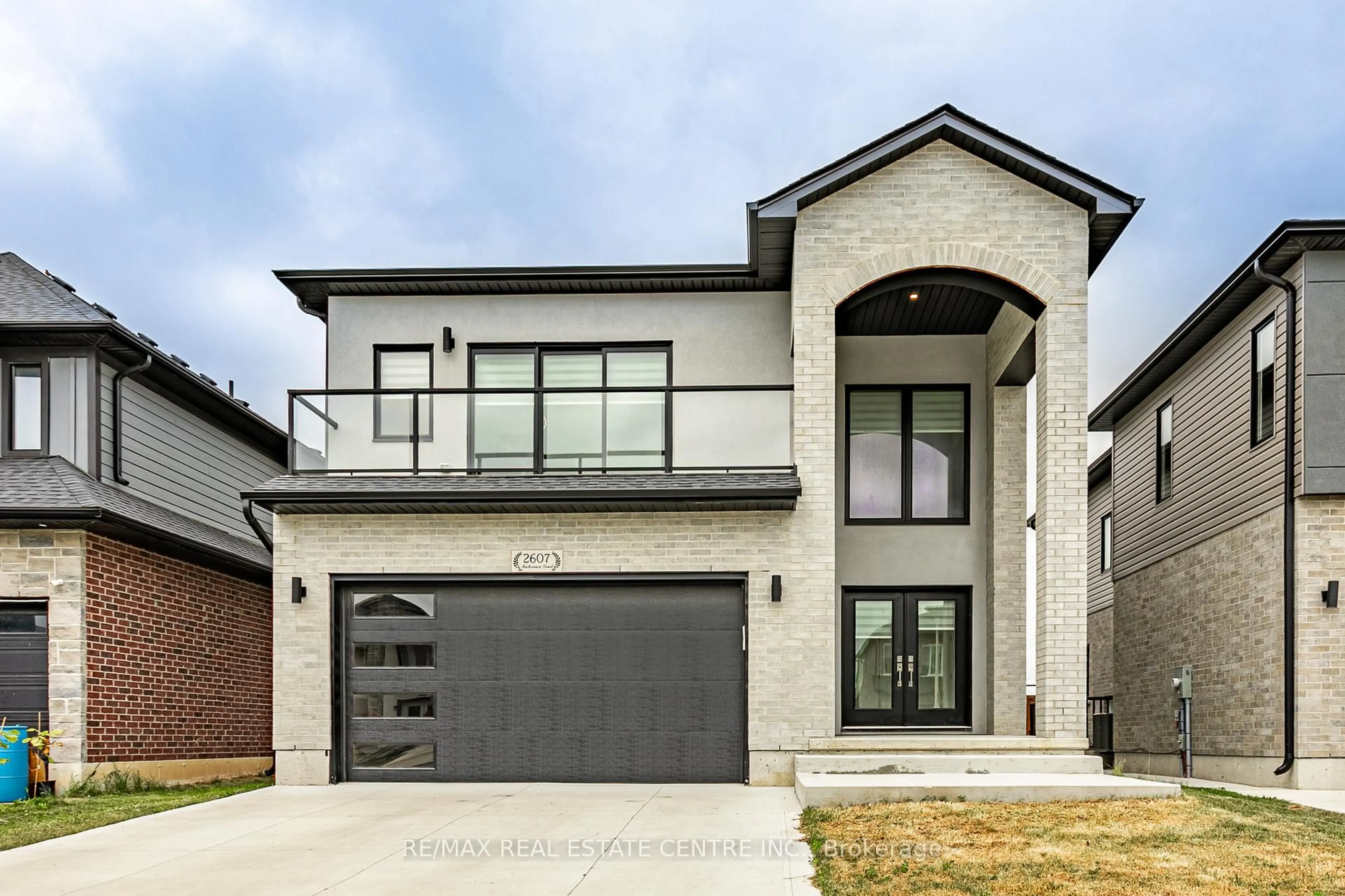 Home with brick exterior material, street for 2607 Bateman Tr, London South Ontario N6L 0H2