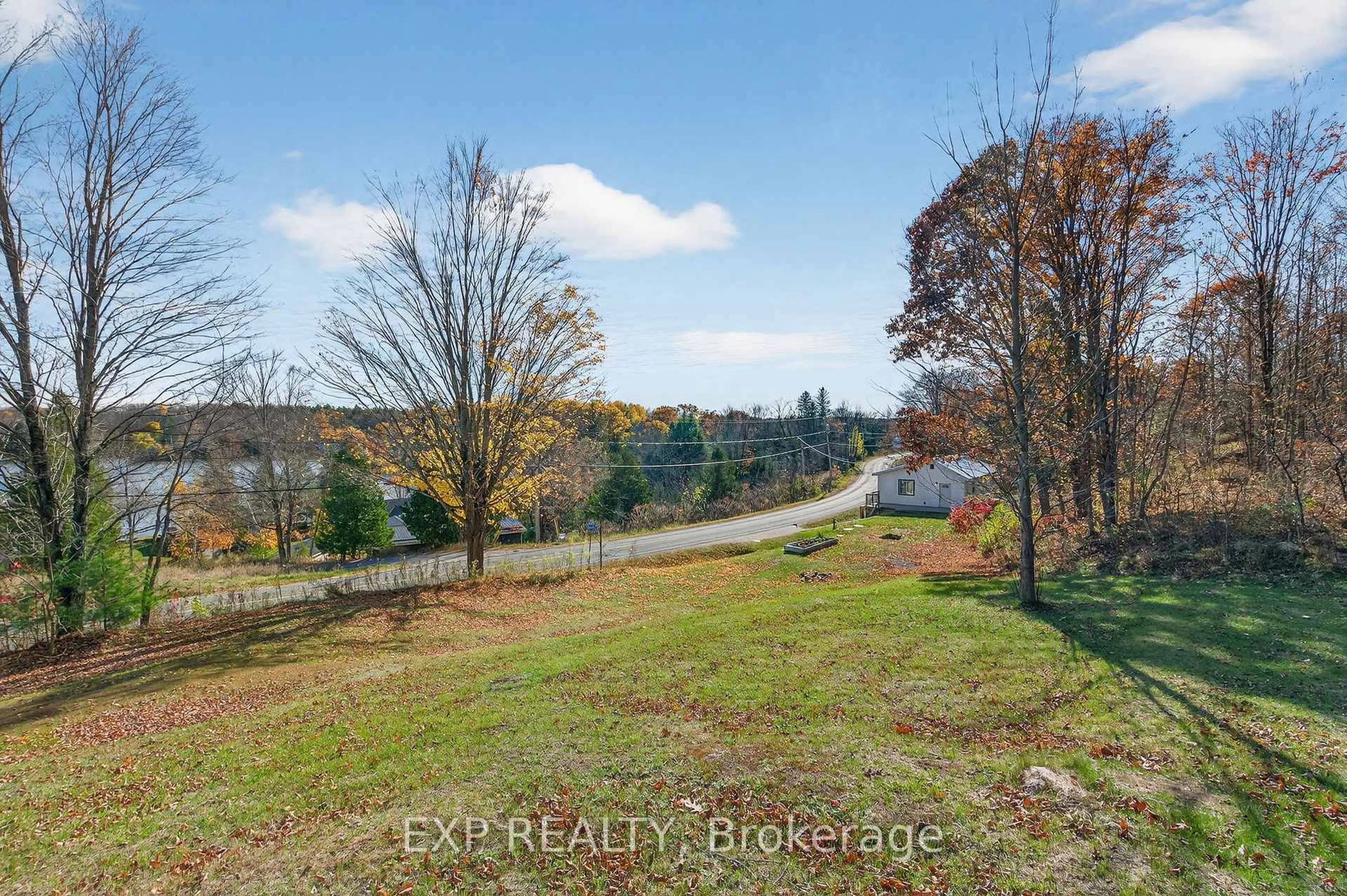 A pic from outside/outdoor area/front of a property/back of a property/a pic from drone, water/lake/river/ocean view for 6129 Arden Rd, Arden Ontario K0H 1B0