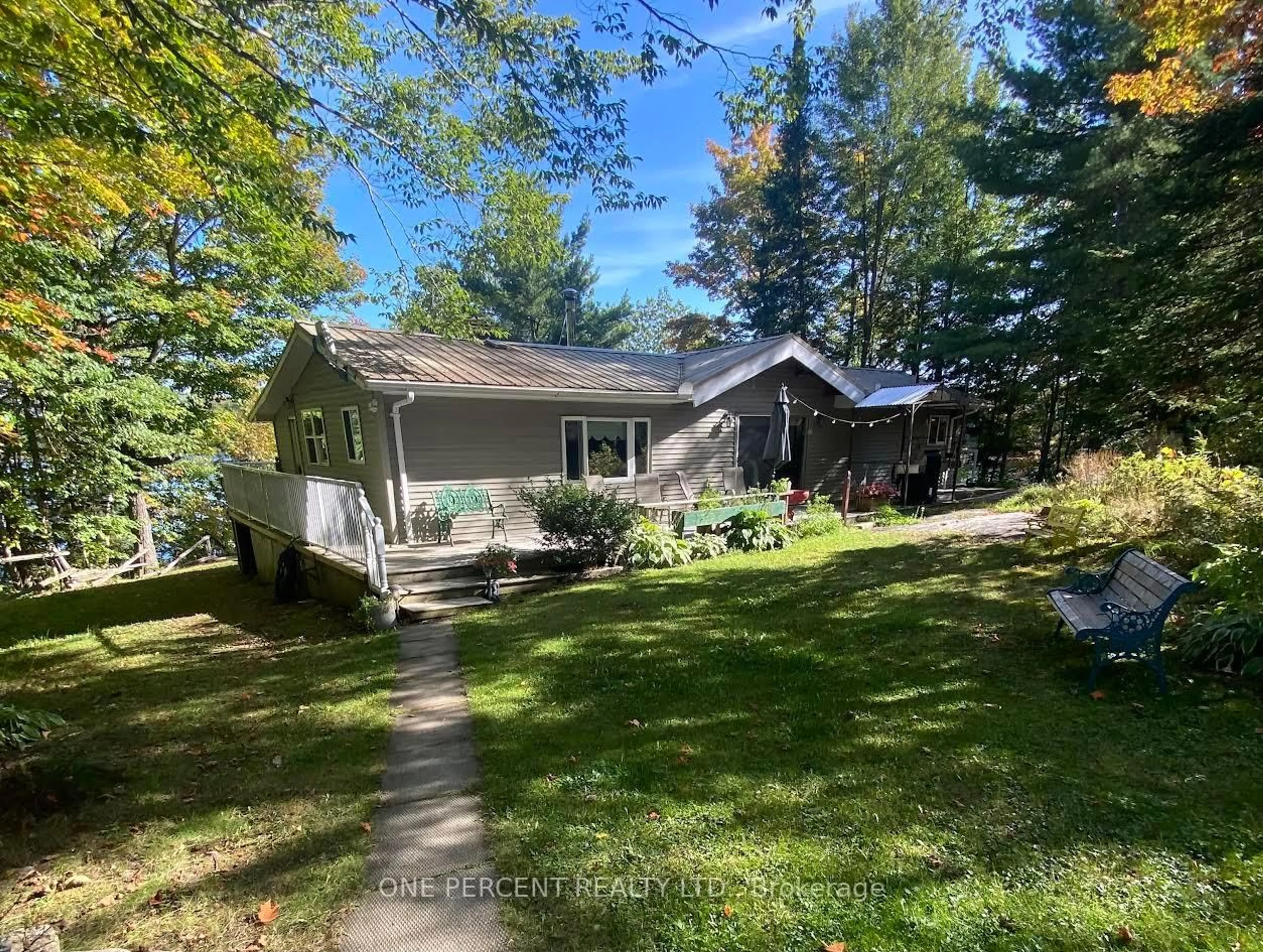 A pic from outside/outdoor area/front of a property/back of a property/a pic from drone, forest/trees view for 1260 Winders Bay Rd, Lake of Bays Ontario P0B 1A0