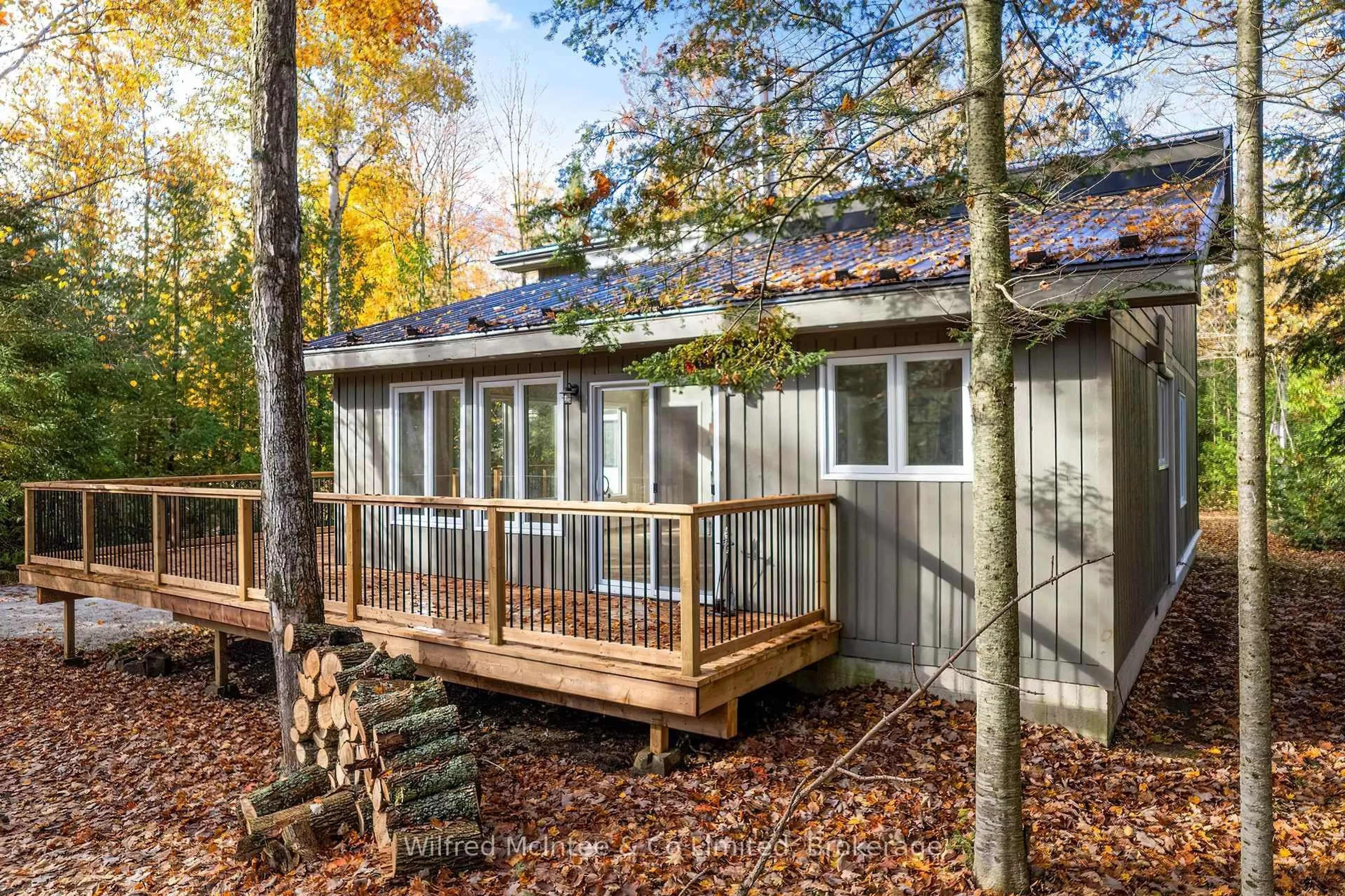 Home with vinyl exterior material, forest/trees view for 40 Rolling Hills Dr, South Bruce Peninsula Ontario N0H 2T0