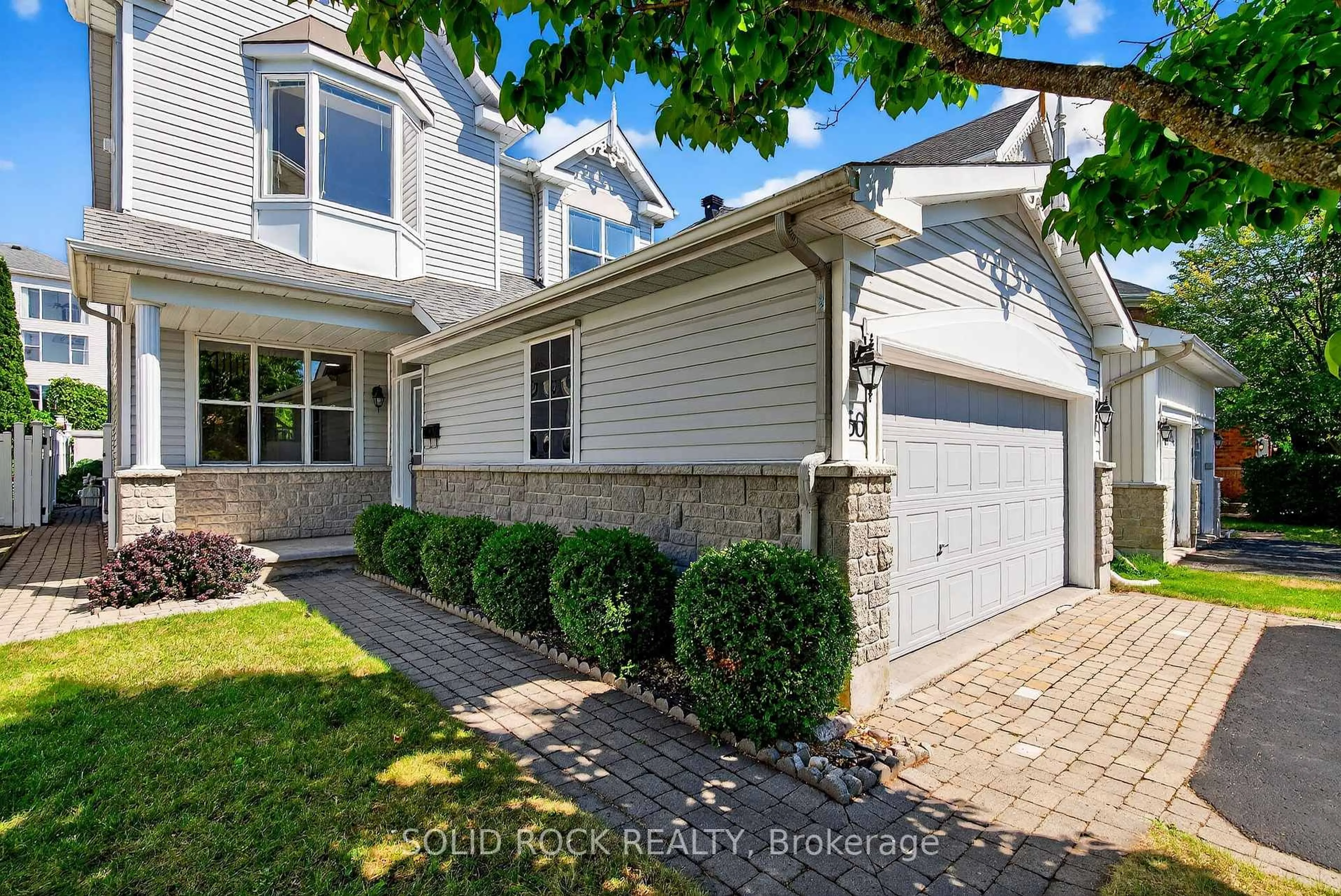 Home with brick exterior material, street for 50 Insmill Cres, Ottawa Ontario K2T 1G4