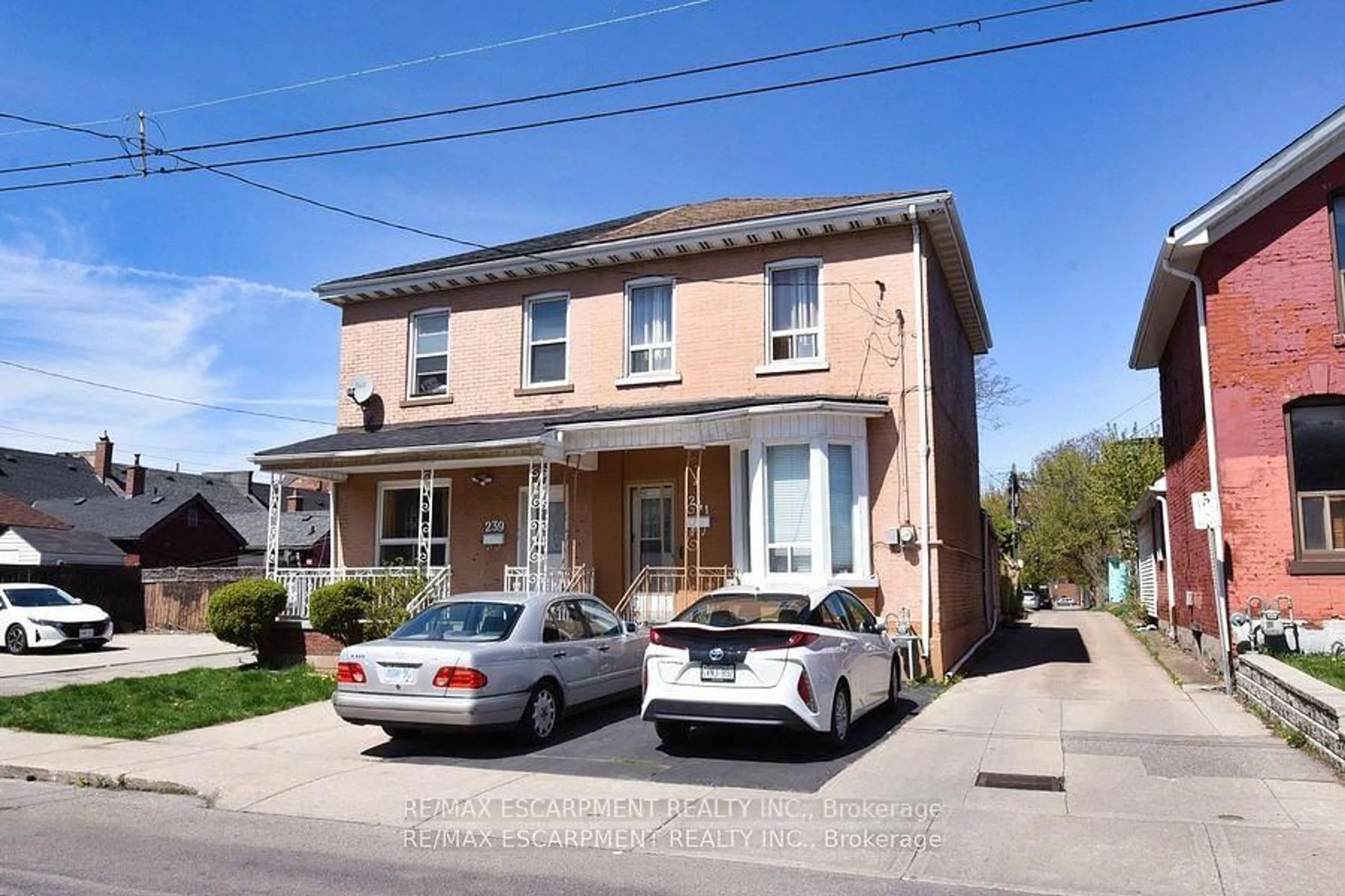 Home with brick exterior material, street for 241 Robert St, Hamilton Ontario L8L 2R3