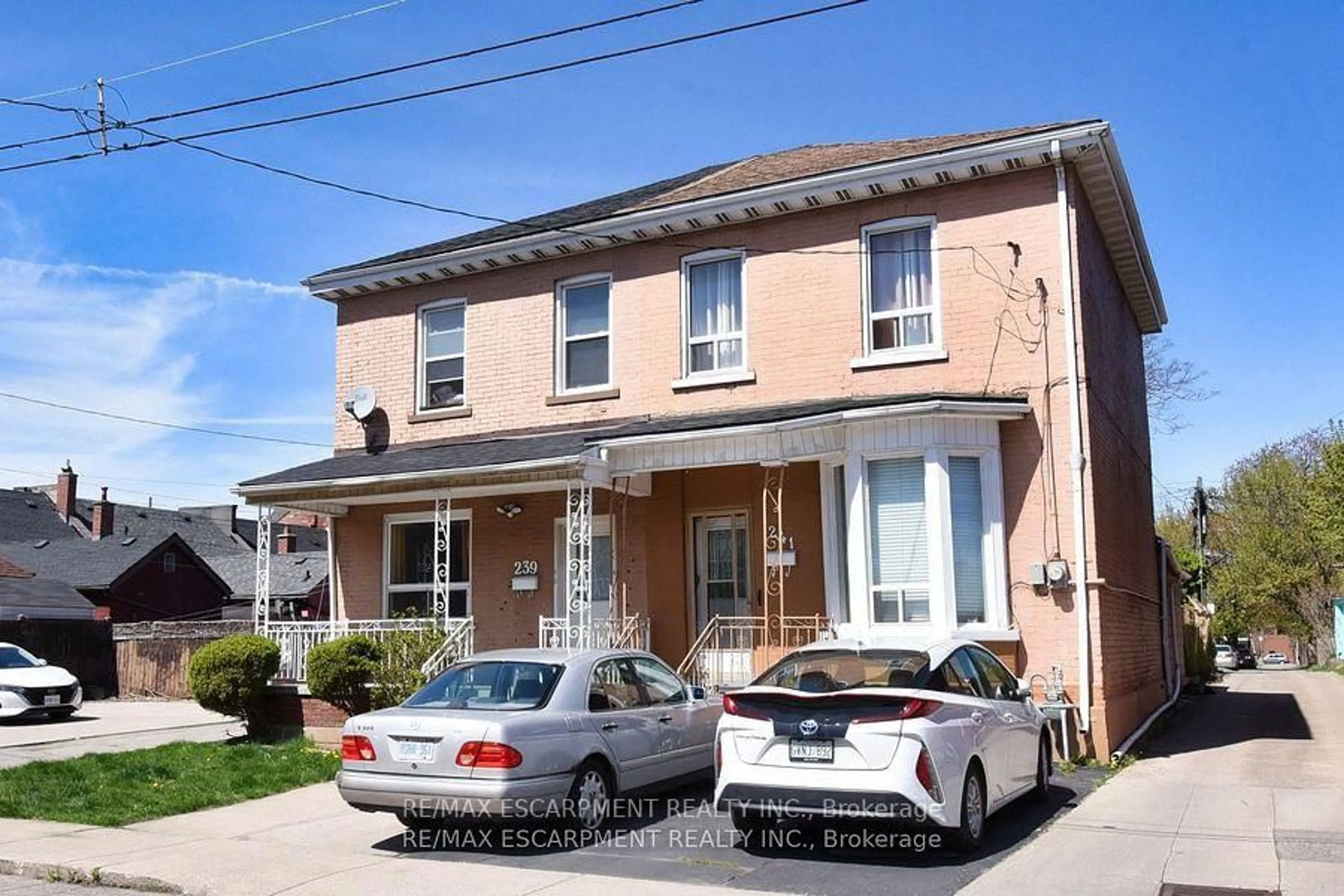 Home with brick exterior material, street for 241 Robert St, Hamilton Ontario L8L 2R3