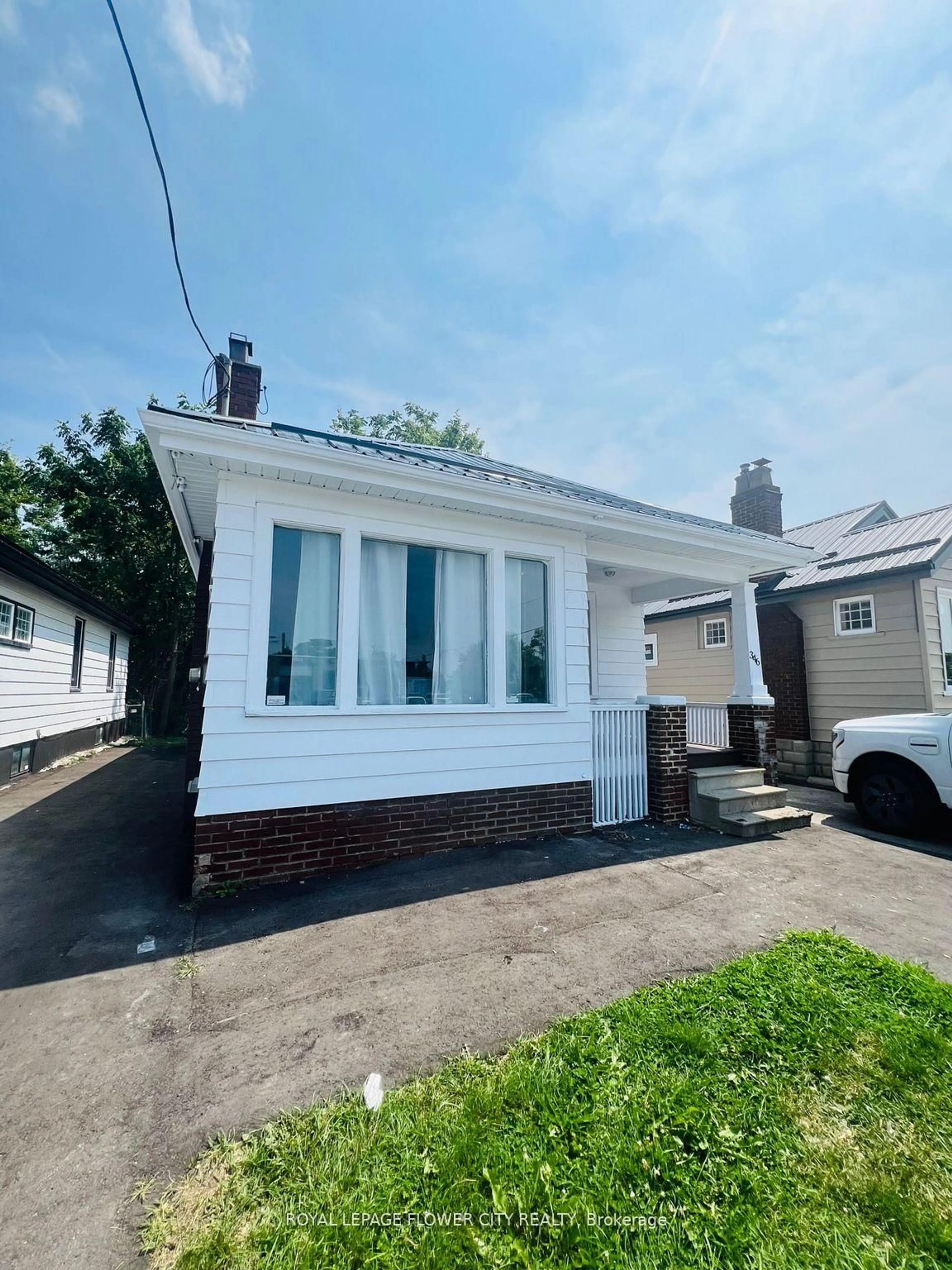 Home with vinyl exterior material, street for 346 Wharncliffe Rd, London South Ontario N6J 2L8