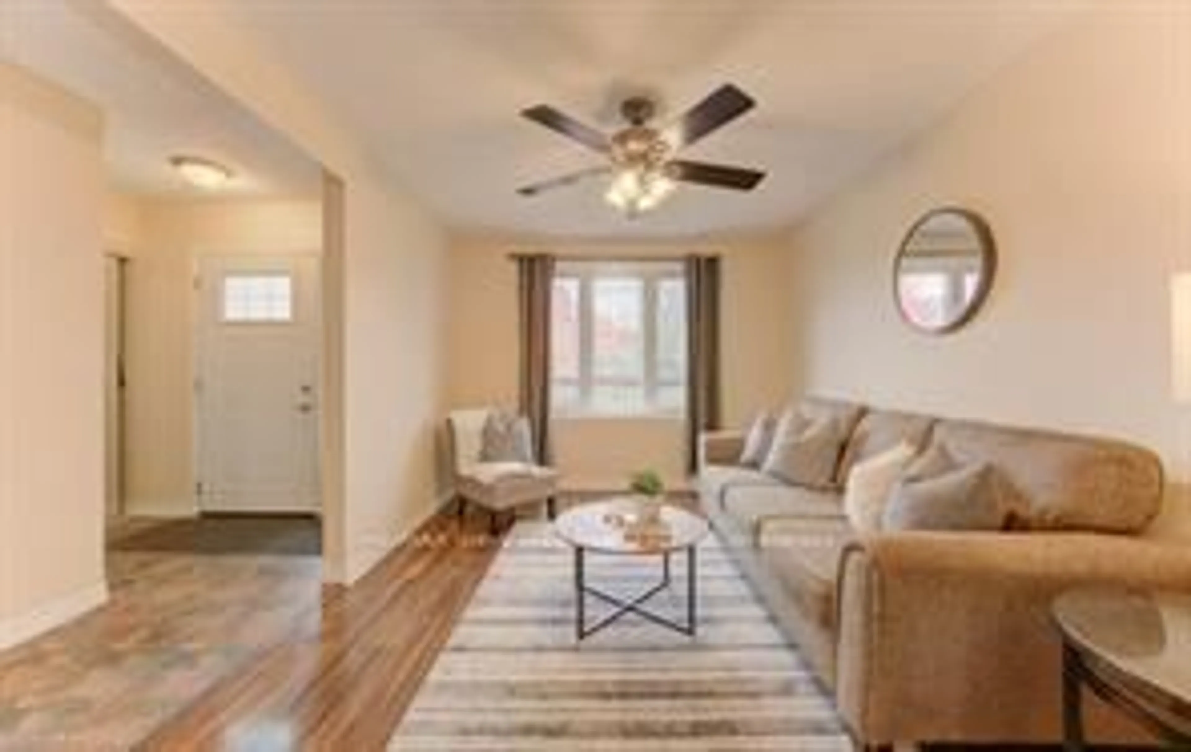 Living room with furniture, wood/laminate floor for 50 Newbury Dr, Kitchener Ontario N2N 2X6