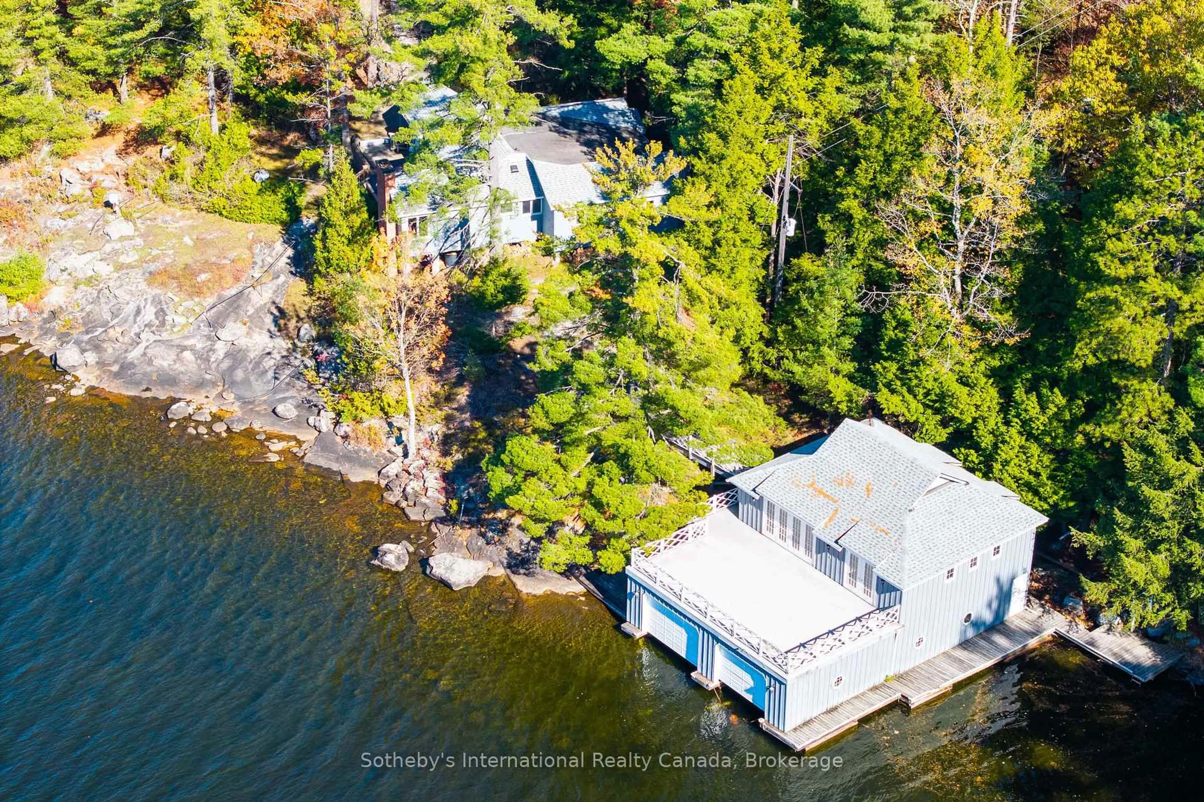 A pic from outside/outdoor area/front of a property/back of a property/a pic from drone, water/lake/river/ocean view for 1-1076 Birch Point Rd, Gravenhurst Ontario P1P 1R1