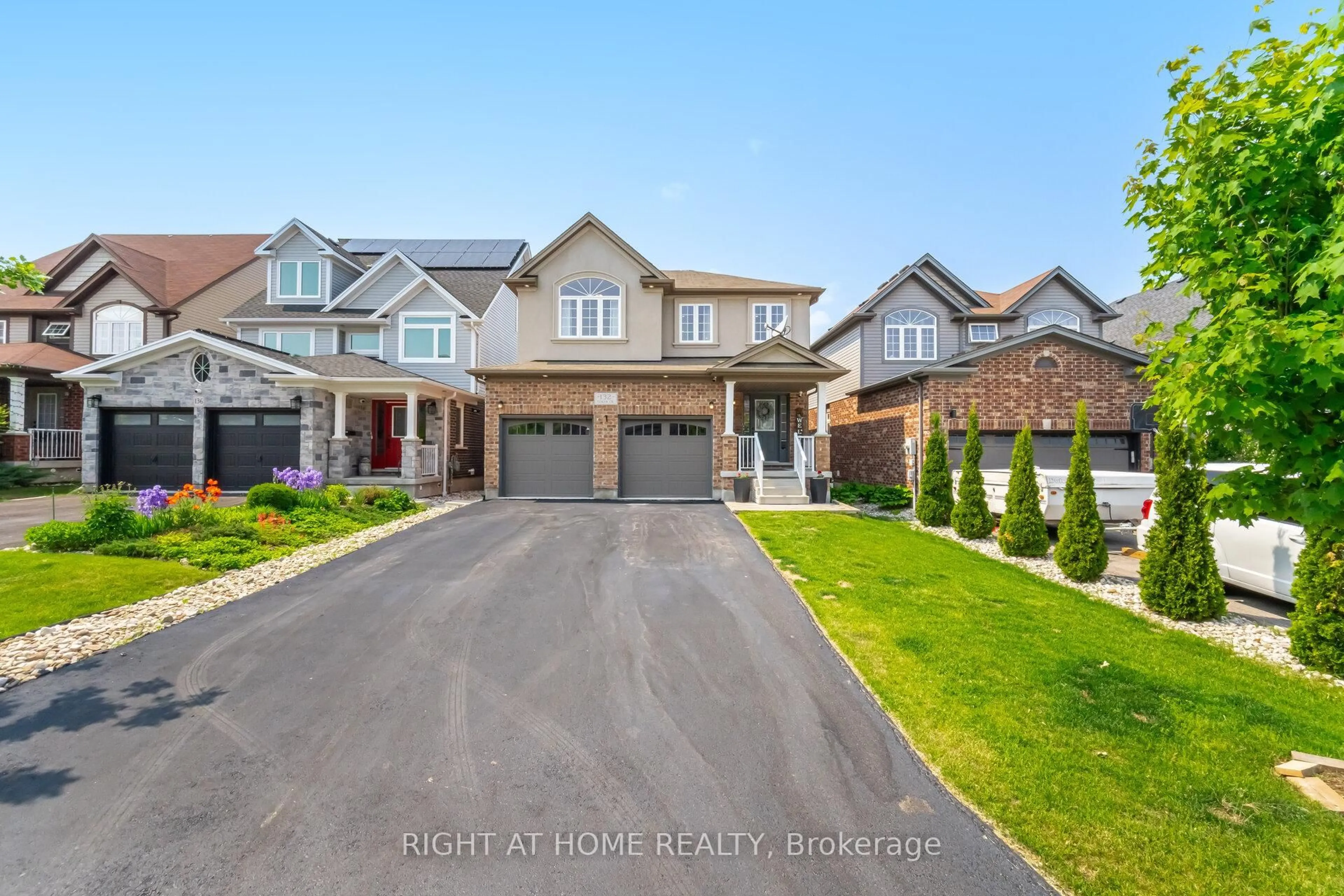 A pic from outside/outdoor area/front of a property/back of a property/a pic from drone, street for 132 Coker Cres, Guelph/Eramosa Ontario N0B 2K0